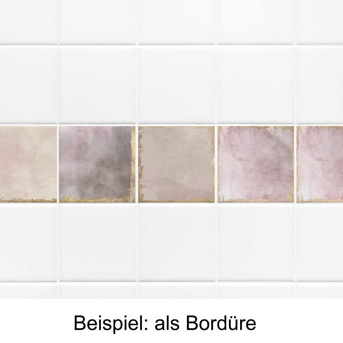 Fliesenbordüre in sanften Rosa- und Grautönen mit goldenen Akzenten.
