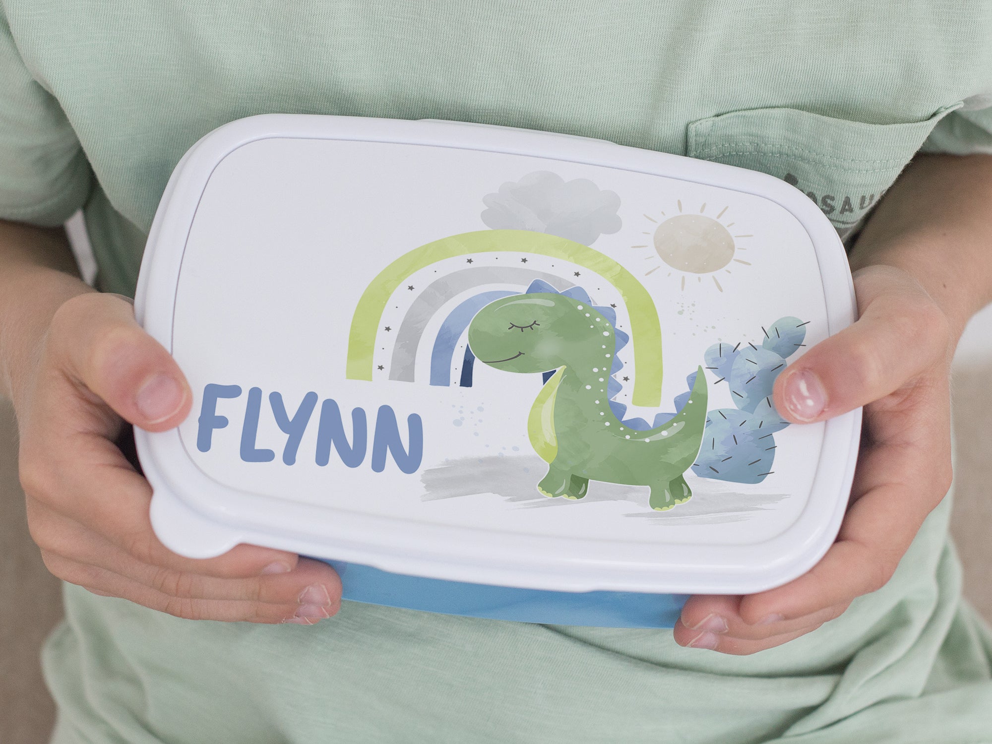 Lunchbox mit Dinosaurier-Motiv, grün und bunt, personalisiert.