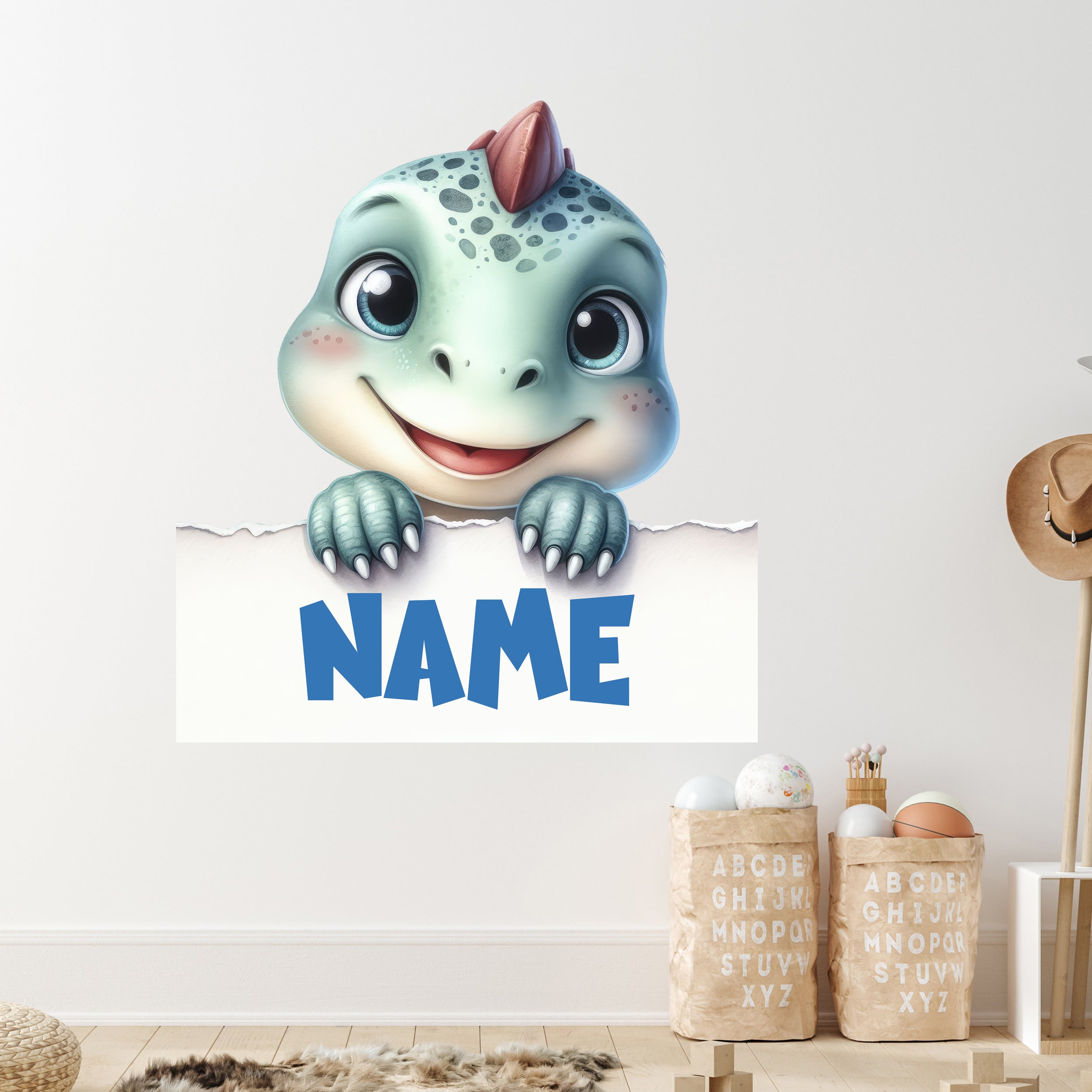 Süßes Dinosaurier-Motiv mit Platz für Namen in Blau.