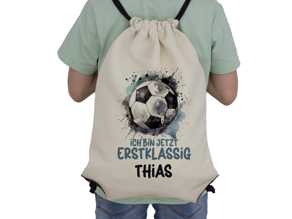 Beige Rucksack mit Fußball-Design und personalisiertem Text.