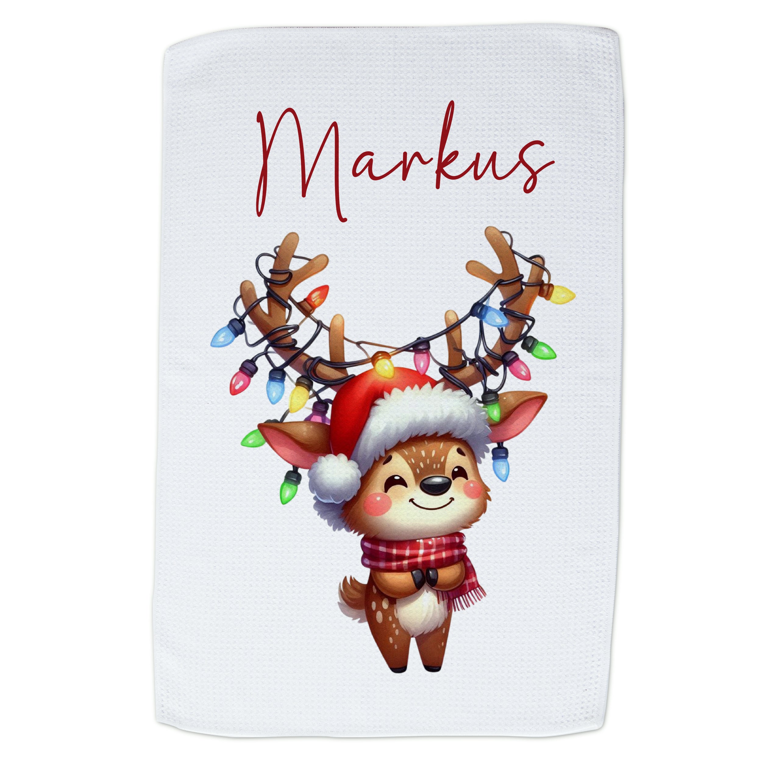 Weißes Handtuch mit niedlichem Rentier und Weihnachtslichtern.