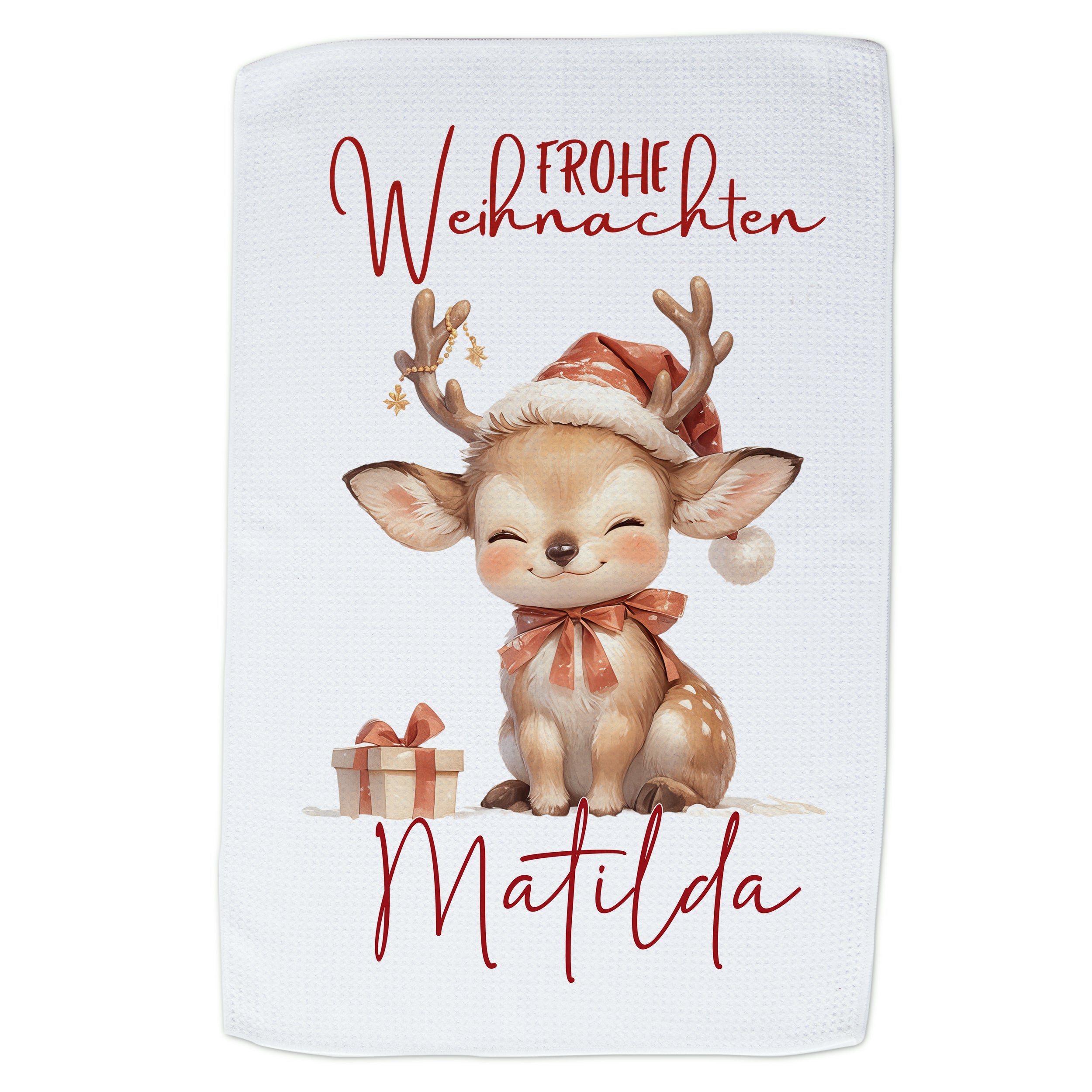 Weihnachtliches Geschirrtuch mit niedlichem Reh und rotem Text.