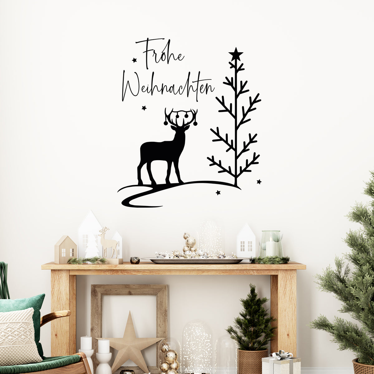 Schwarzer Weihnachtswandaufkleber mit Rentier und Baum.