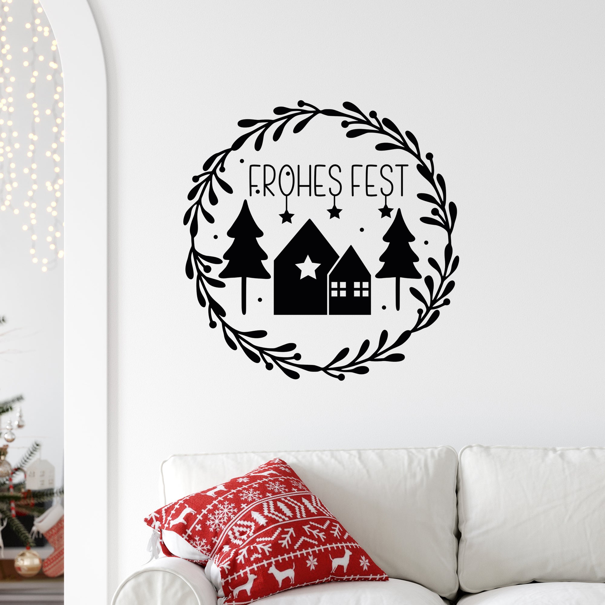 Wandtattoo mit schwarzem Weihnachtsmotiv und Schriftzug.