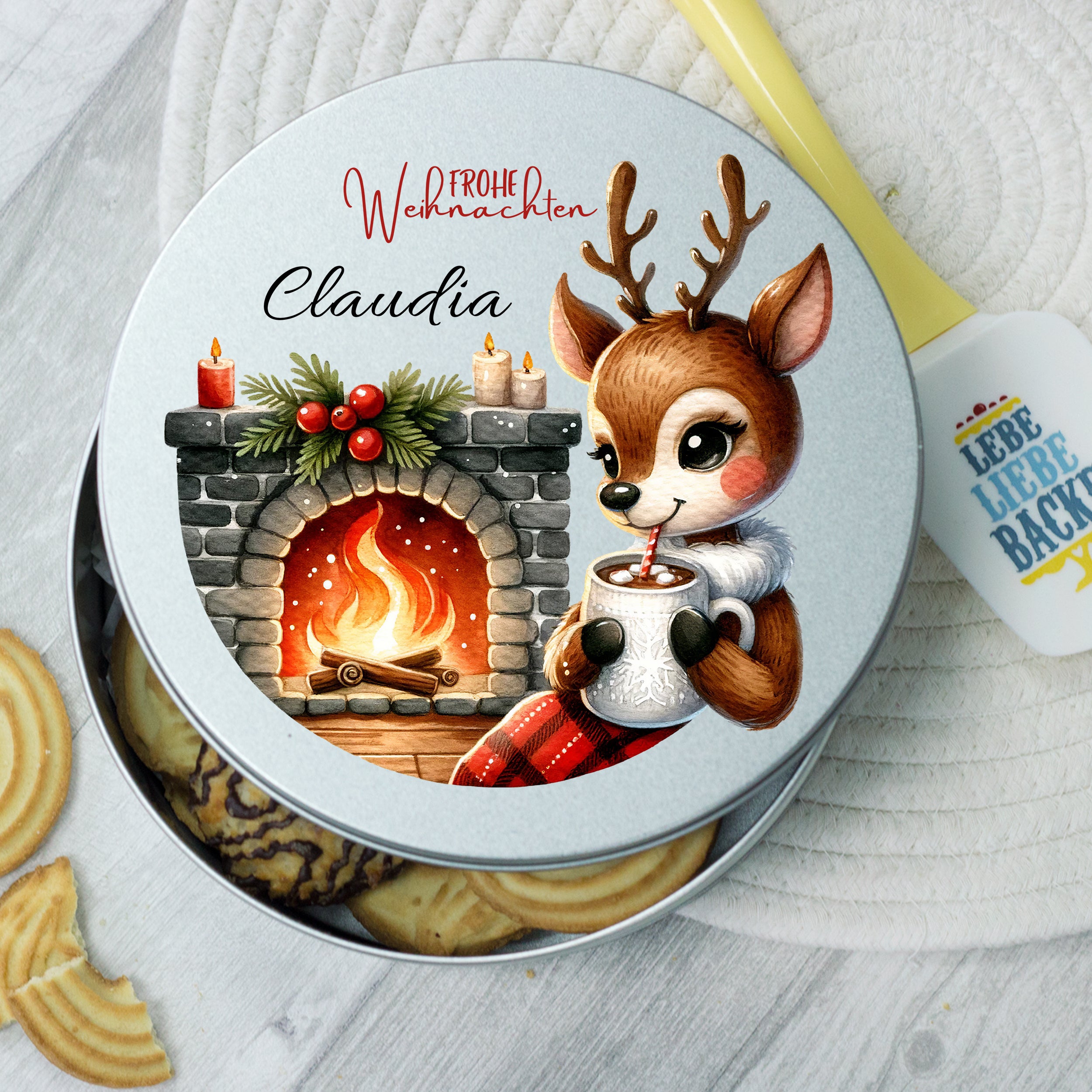 Rundes, silbernes Plätzchen-Dose mit Weihnachtsmotiv und Reh.
