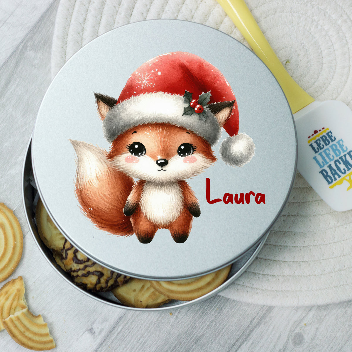Kekse Dose mit niedlichem Fuchs und rotem Weihnachtsmütze.