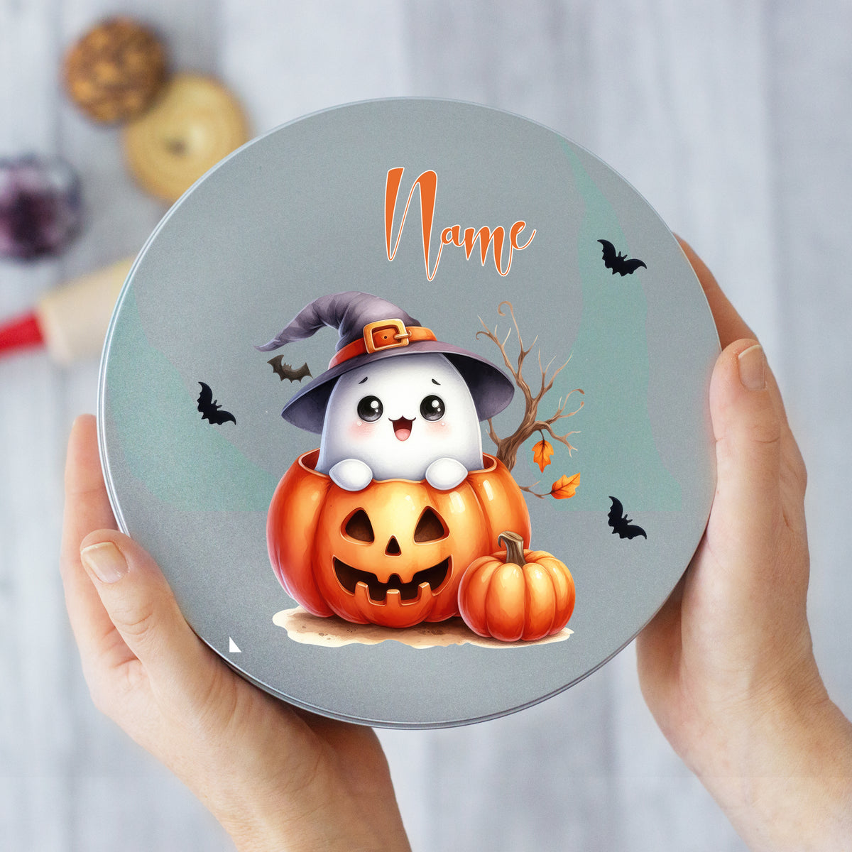 Süßer Geist in Kürbis mit Halloween-Motiven.