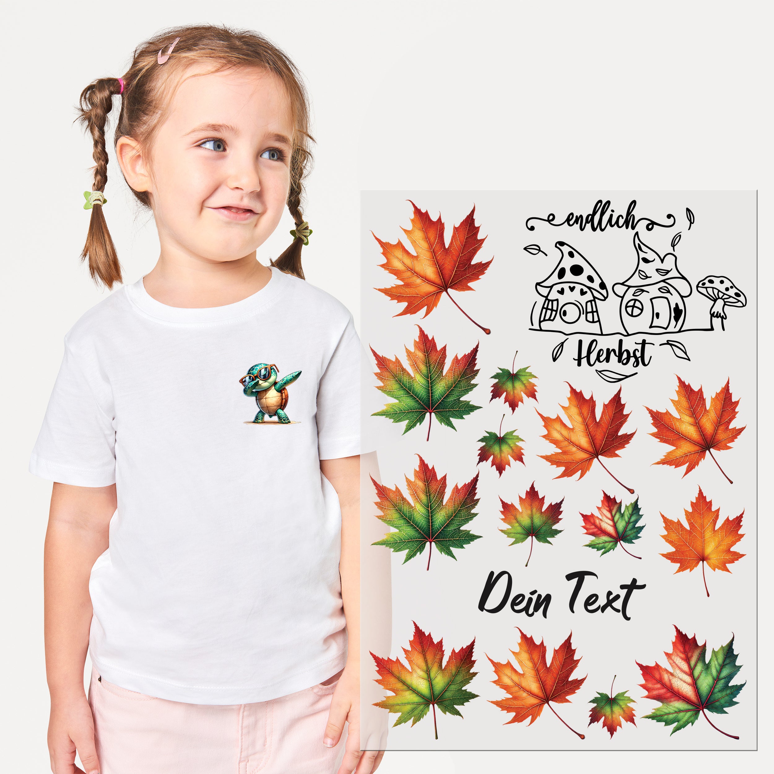 Weißes T-Shirt mit buntem Herbstblatt-Motiv und Kind.