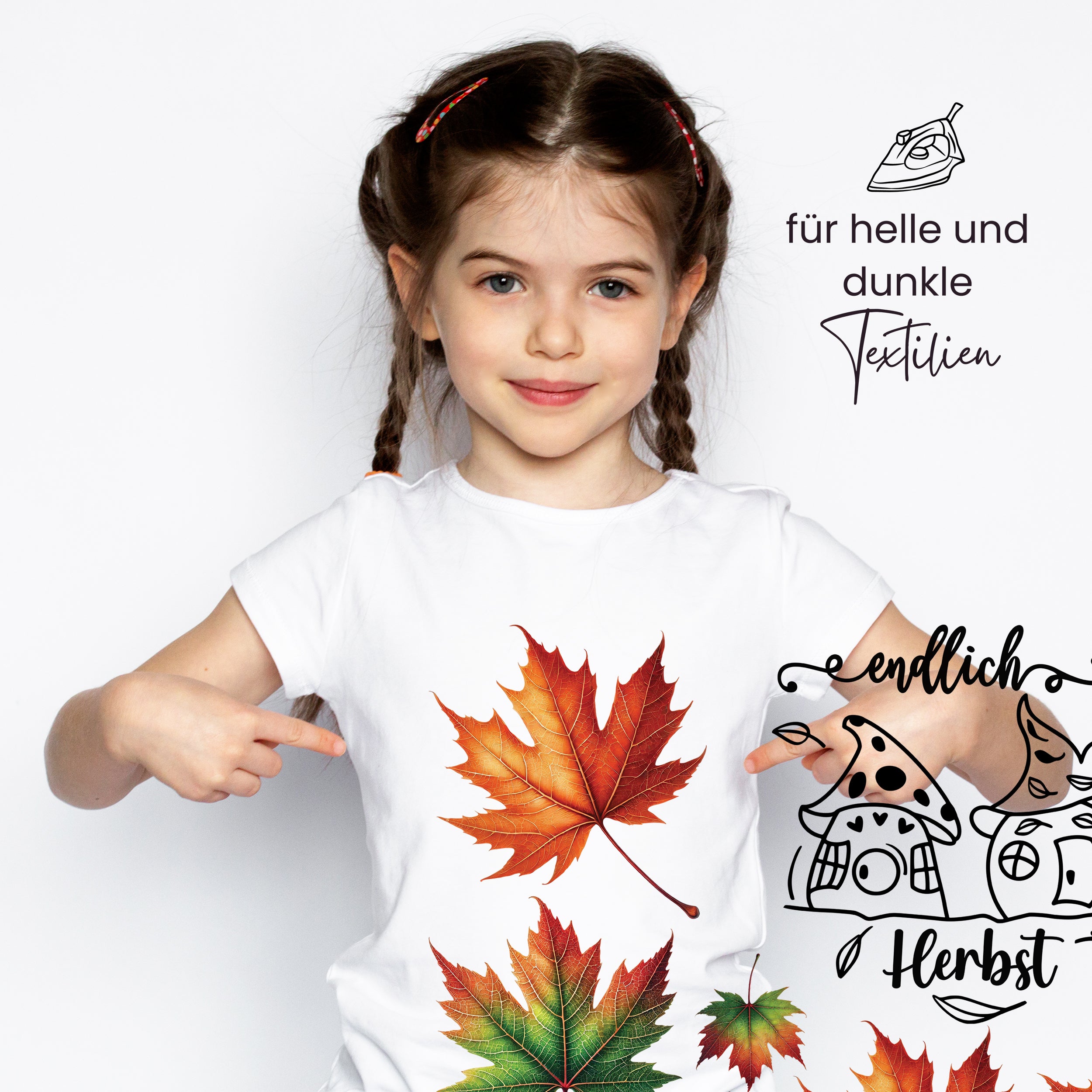 Weißes T-Shirt mit bunten Herbstblättern und Pilzen.