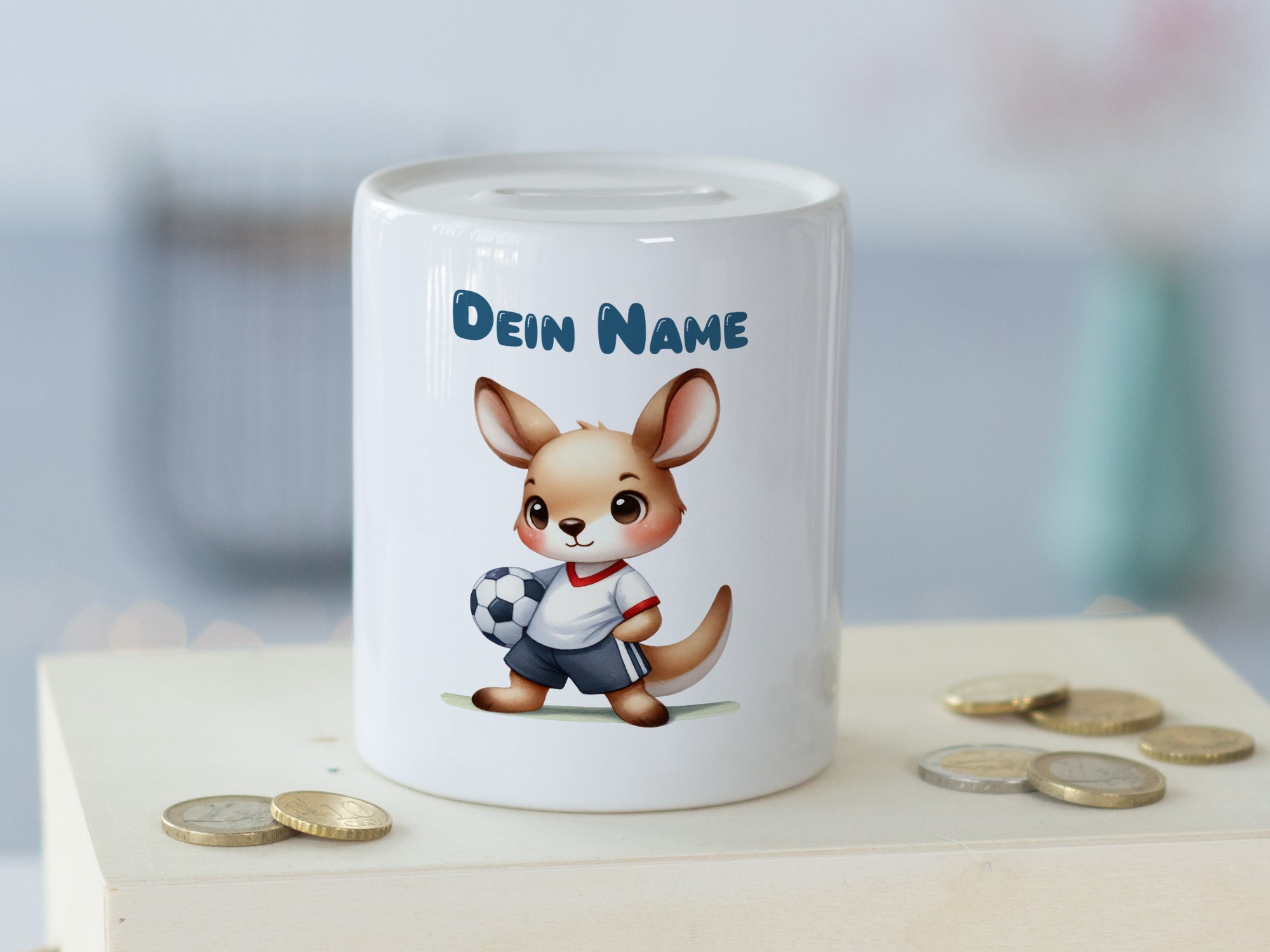 Spardose mit niedlichem Fußball-Känguru