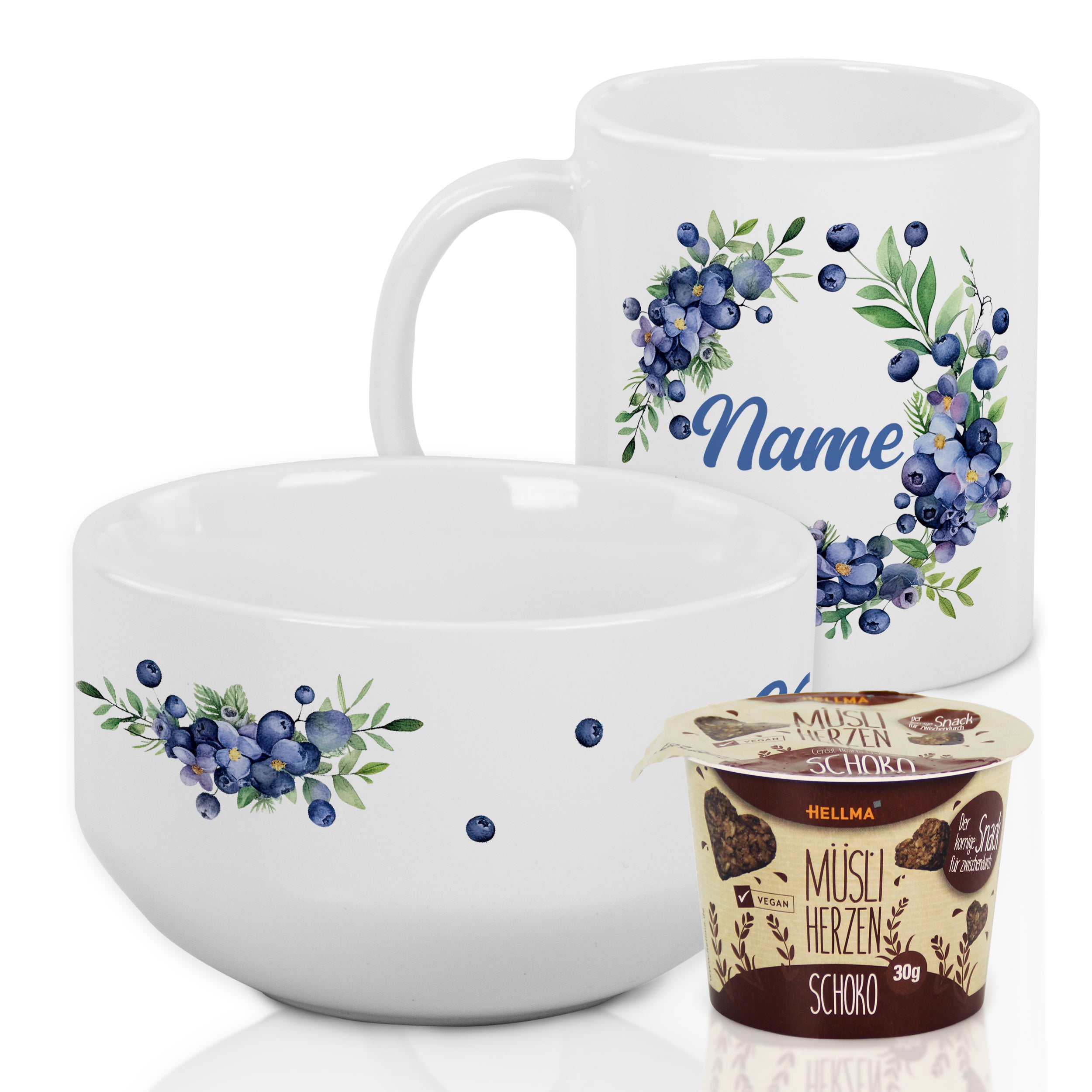 Weiße Schüssel und Tasse mit blauen Beerenmotiven.
