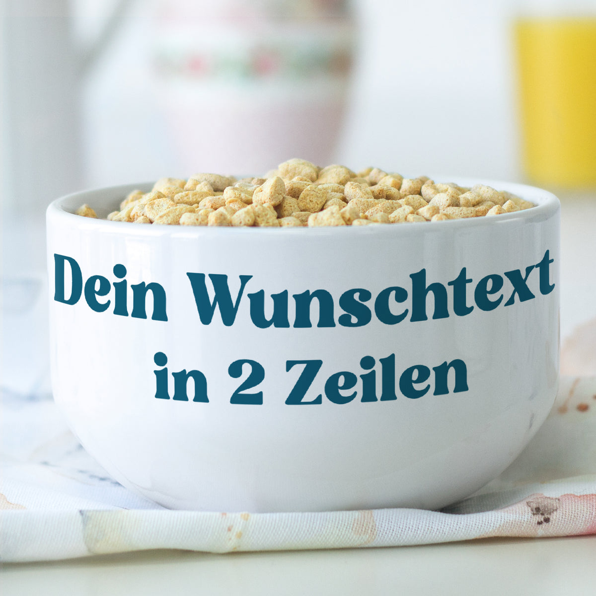 Müslischale mit Wunschtext in zwei Zeilen, gefüllt mit Müsli