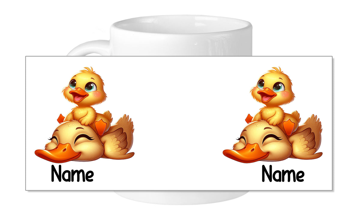 Tasse mit gelben Entenmotiven und Platz für Namen.
