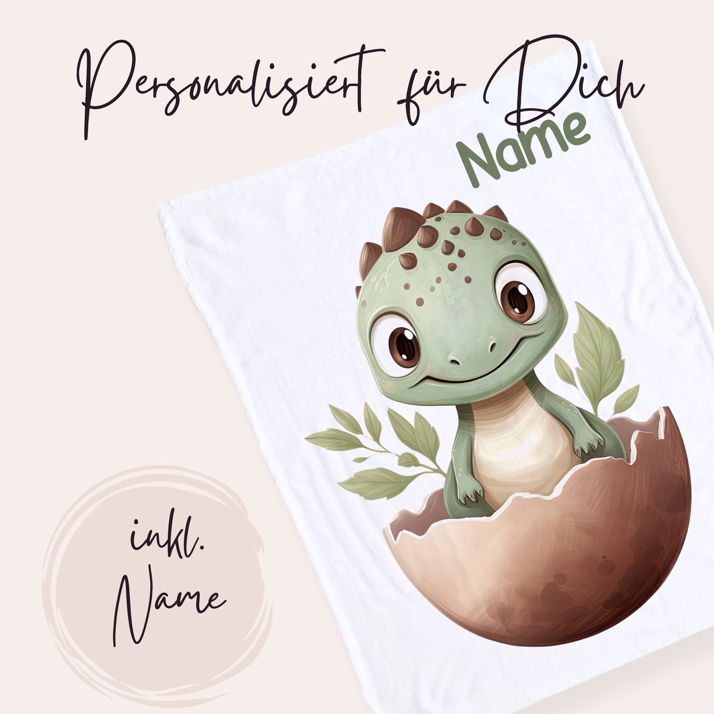 Personalisierte Babydecke mit grünem Dinosaurier und Namen.