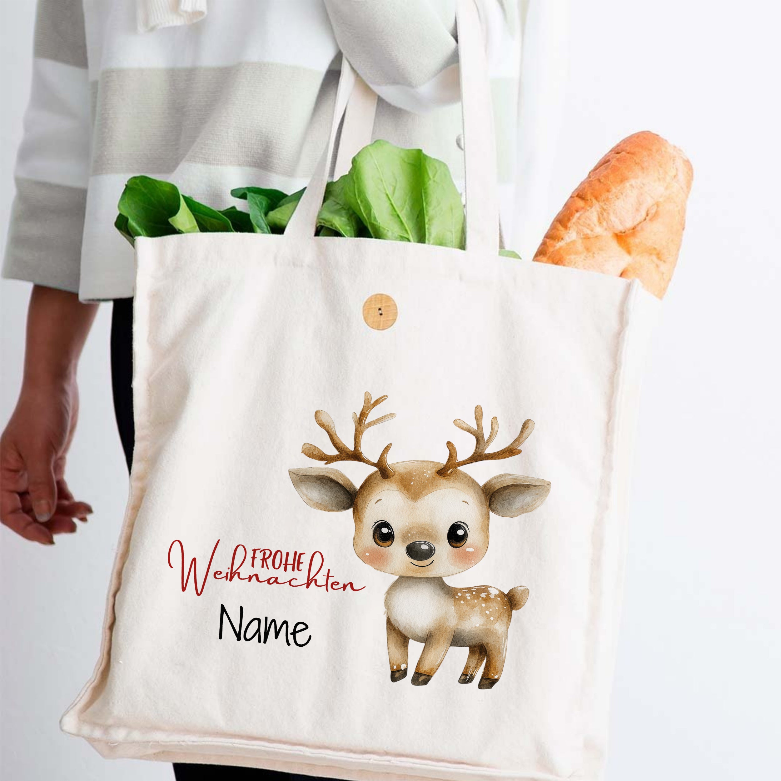 Beige Einkaufstasche mit Rentier-Motiv und Weihnachtsgruß.