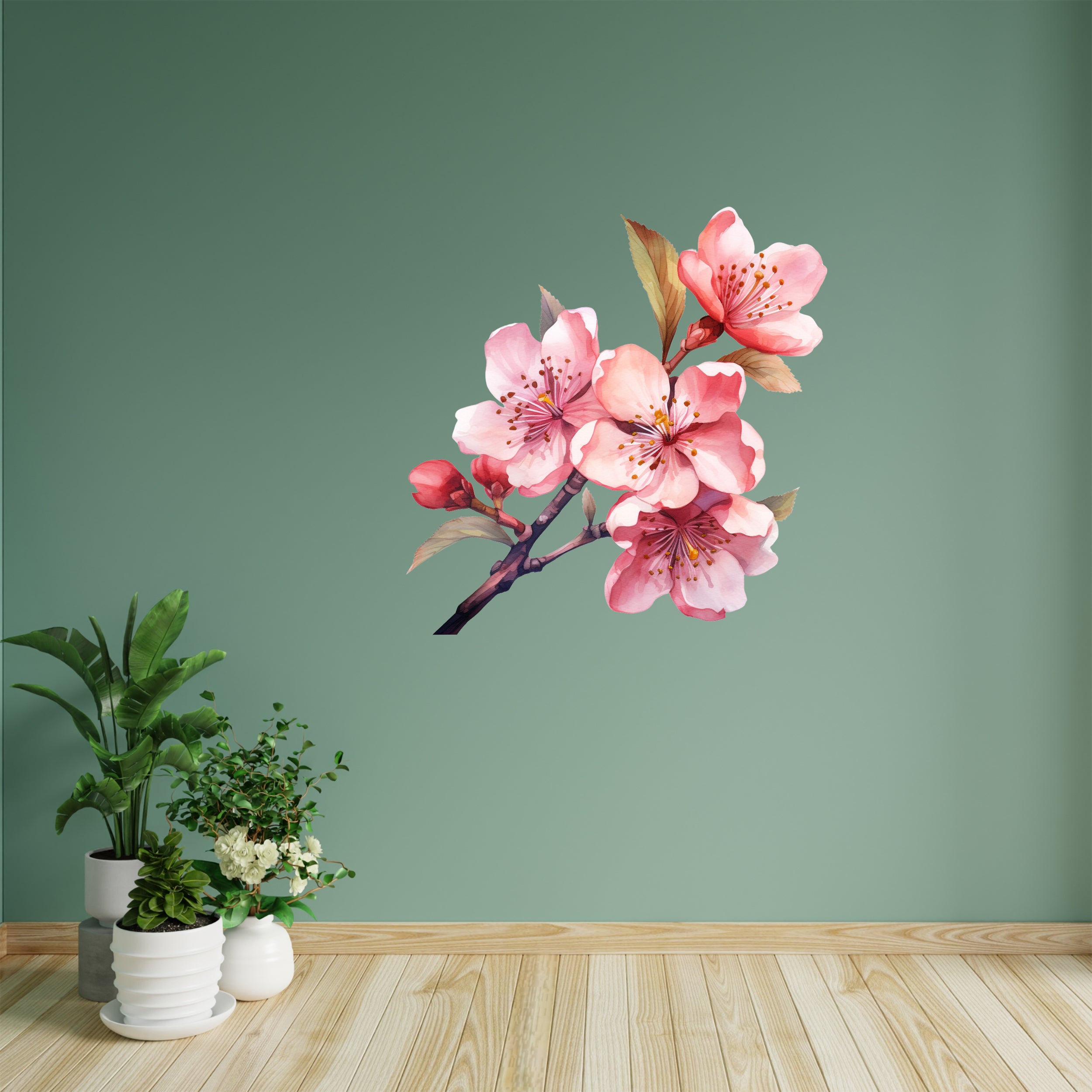 Wandtattoo mit rosa Kirschblüten an grüner Wand