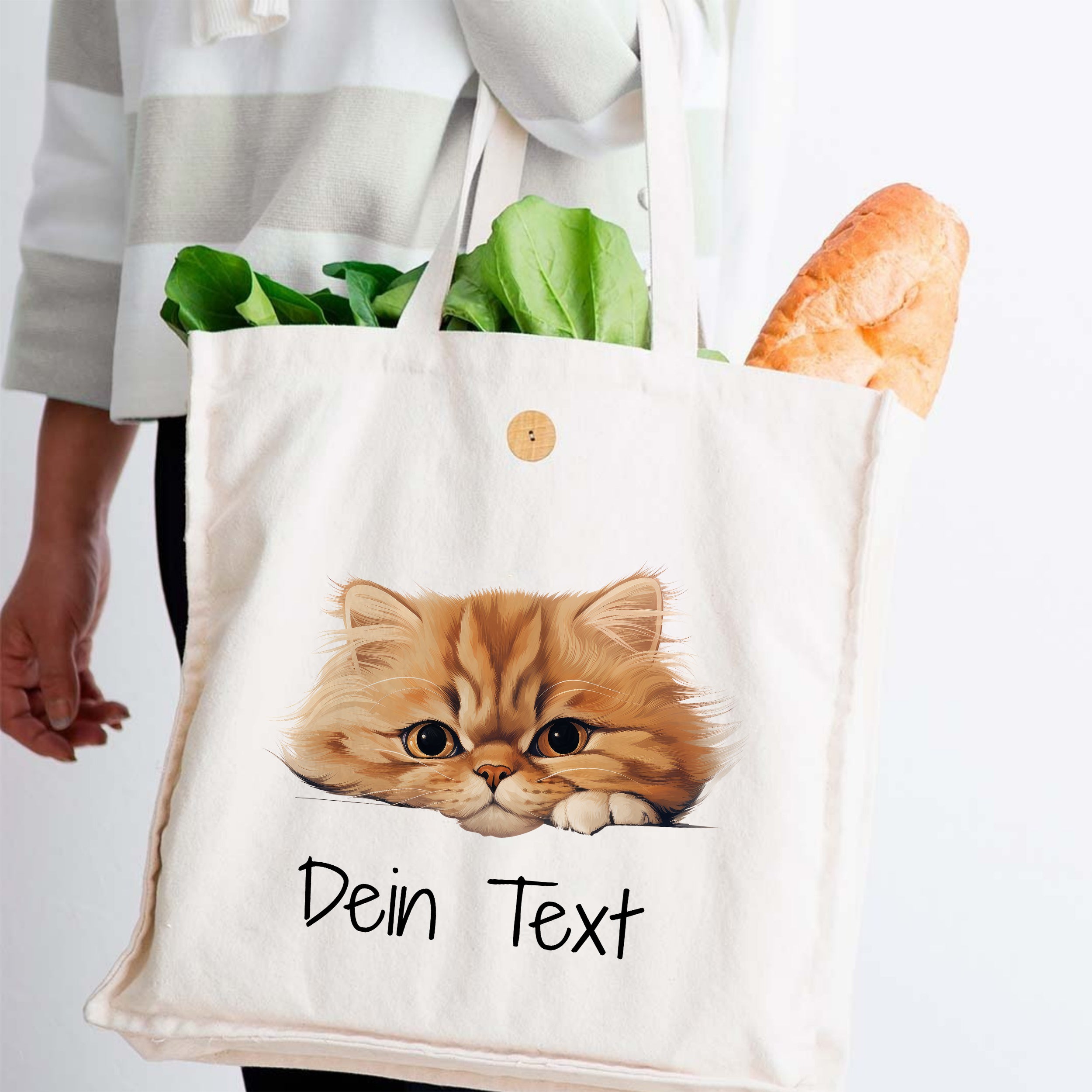 Beige Baumwolltasche mit Katzenmotiv und frischem Gemüse.
