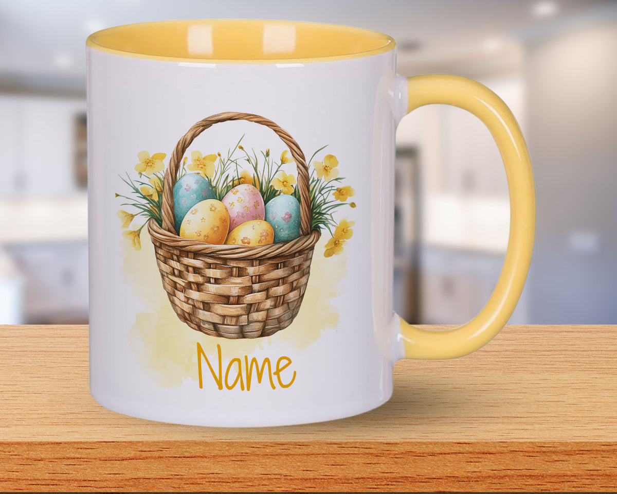 Tasse mit bunten Ostereiern und Korb-Design, gelber Henkel.