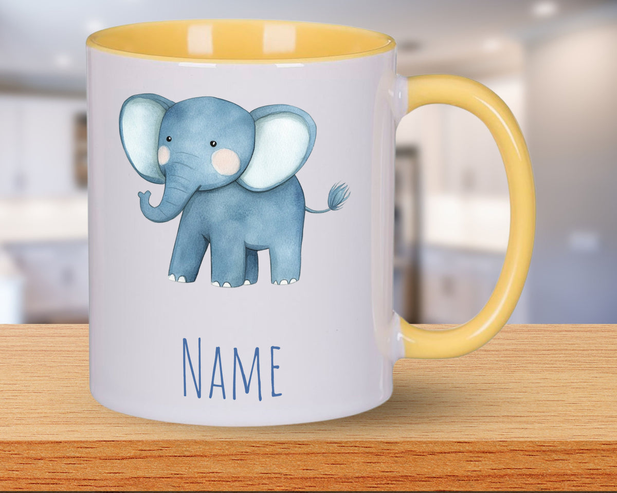 Tasse mit blauem Elefanten und gelbem Henkel.