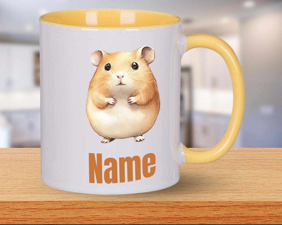 Tasse mit Hamster-Motiv und gelbem Henkel, personalisierbar.