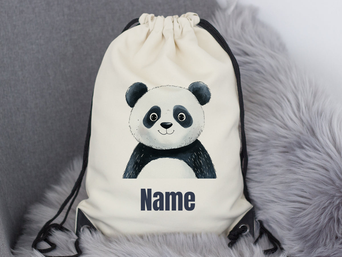 Beige Turnbeutel mit Panda-Motiv und Platz für Namen.