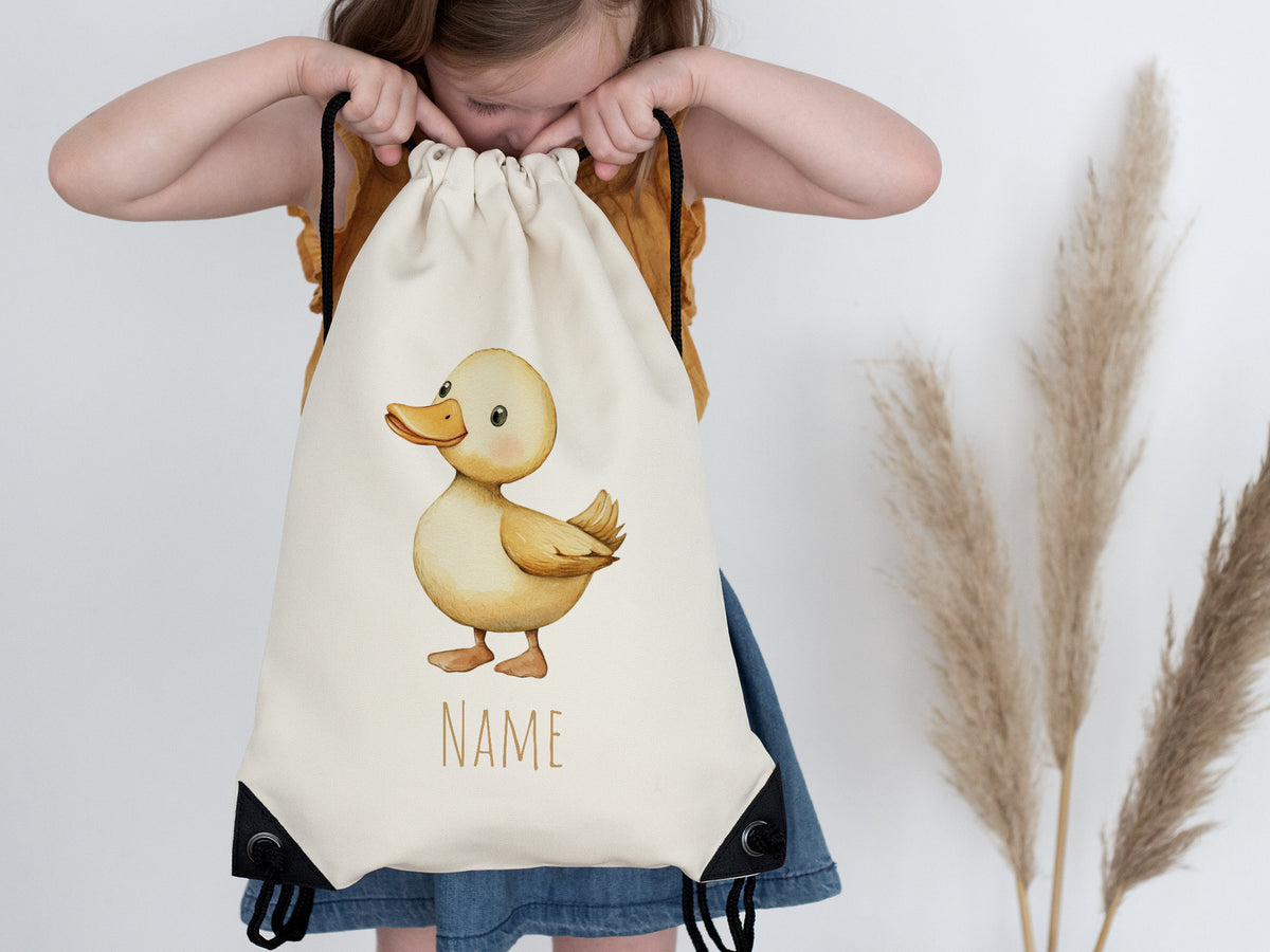 Beige Rucksack mit Entenmotiv und Platz für Namen