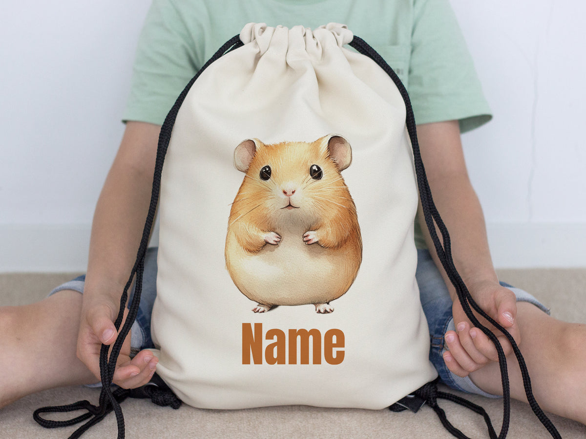 Beige Turnbeutel mit Hamster-Motiv und personalisierbarem Namen.