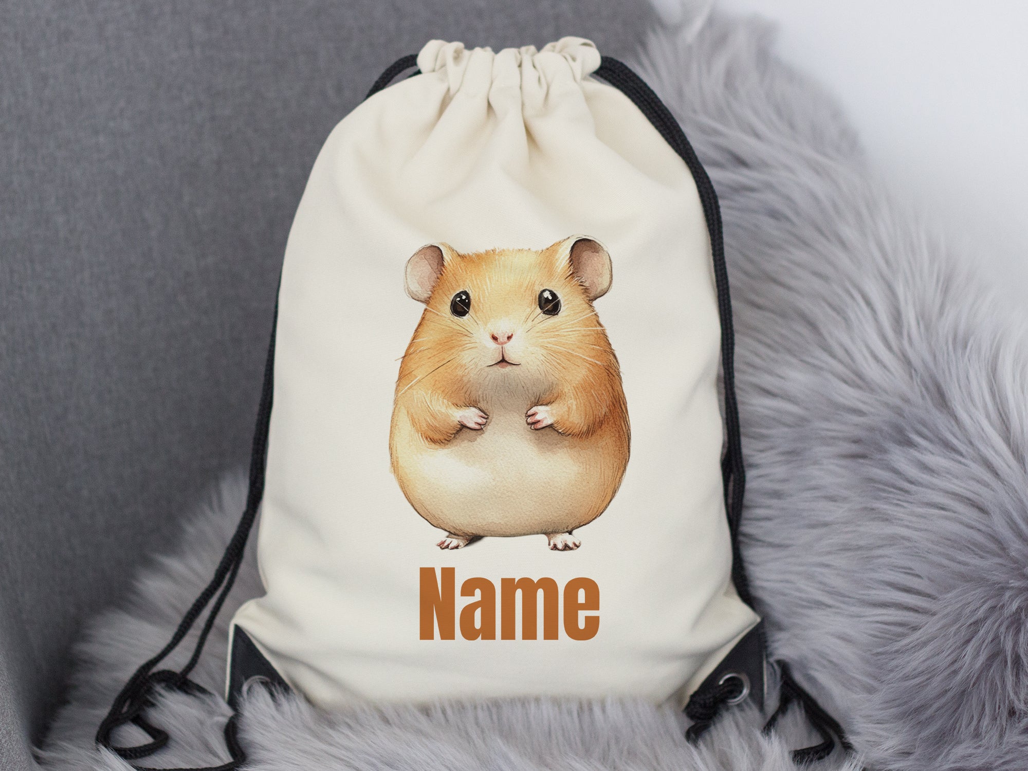 Beige Turnbeutel mit Hamster-Motiv und personalisierbarem Namen.