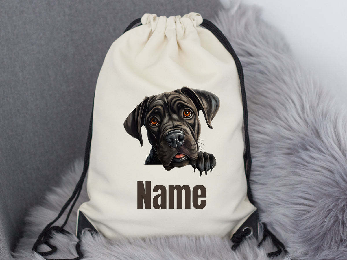 Beige Rucksack mit Hundemotiv und personalisierbarem Namen.