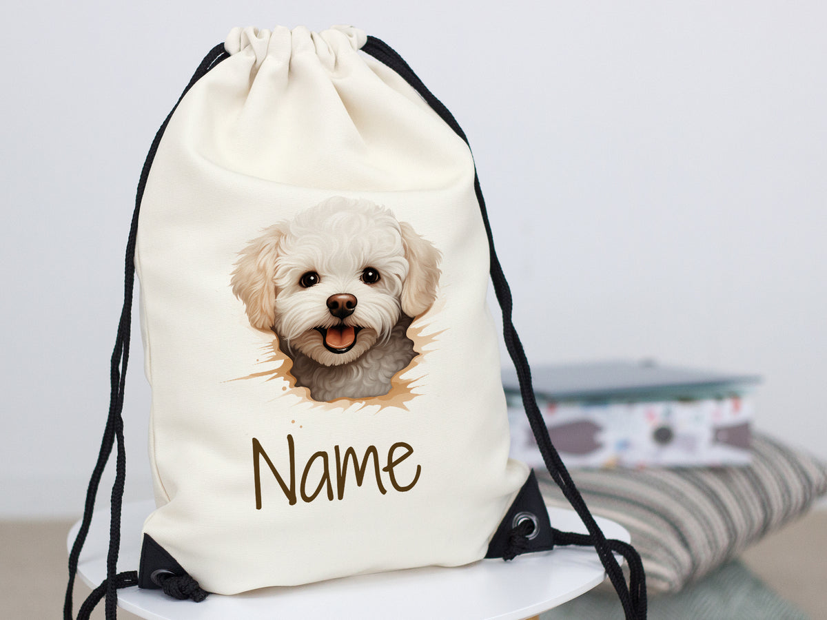 Beige Rucksack mit Hundemotiv und personalisierbarem Namen.