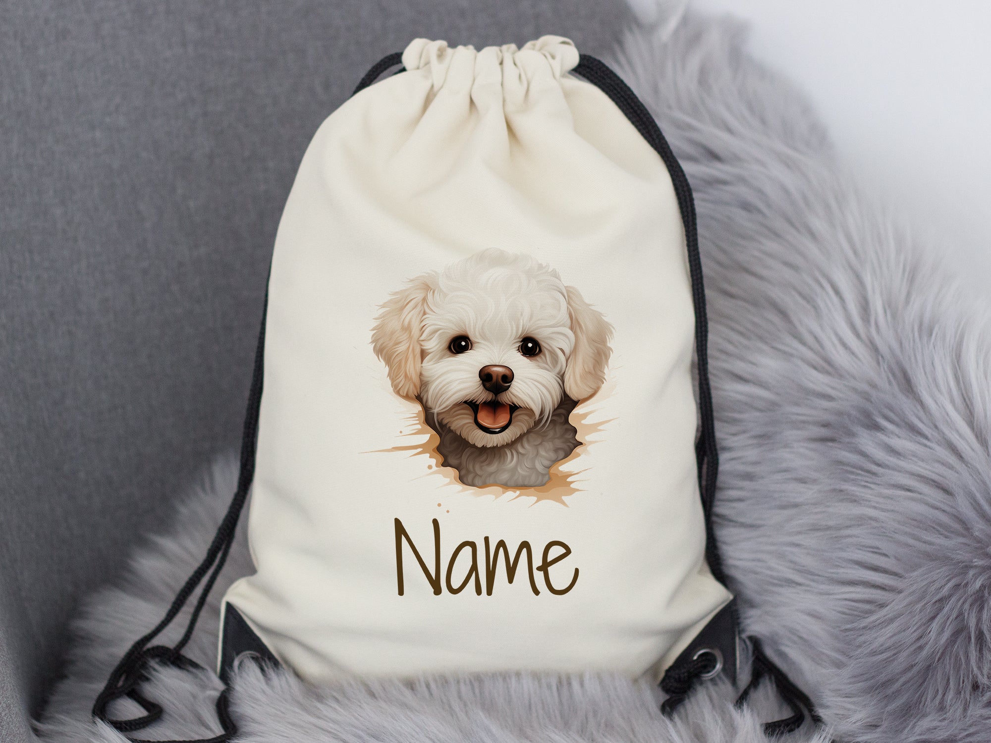 Beige Turnbeutel mit Hundemotiv und personalisierbarem Namen.