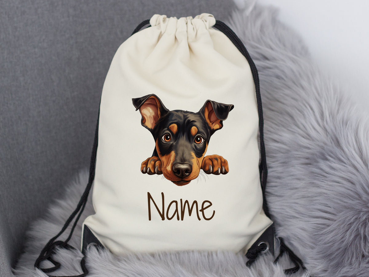 Beige Turnbeutel mit Hundemotiv und personalisierbarem Namen.