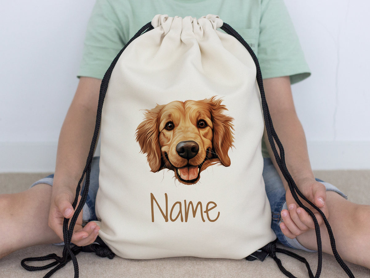 Beige Rucksack mit goldenem Retriever-Motiv und personalisierbarem Namen.