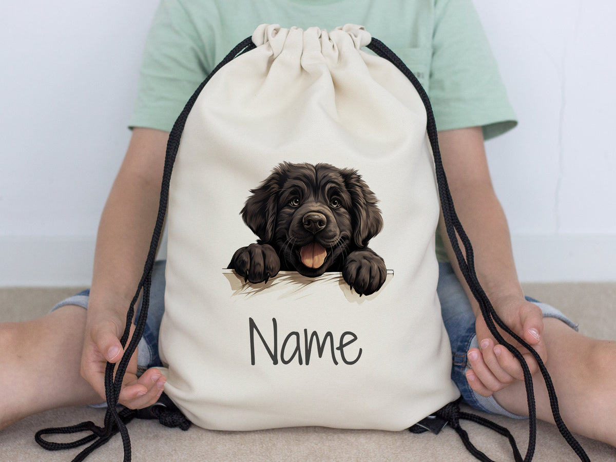 Beige Turnbeutel mit Hundemotiv und personalisierbarem Namen.