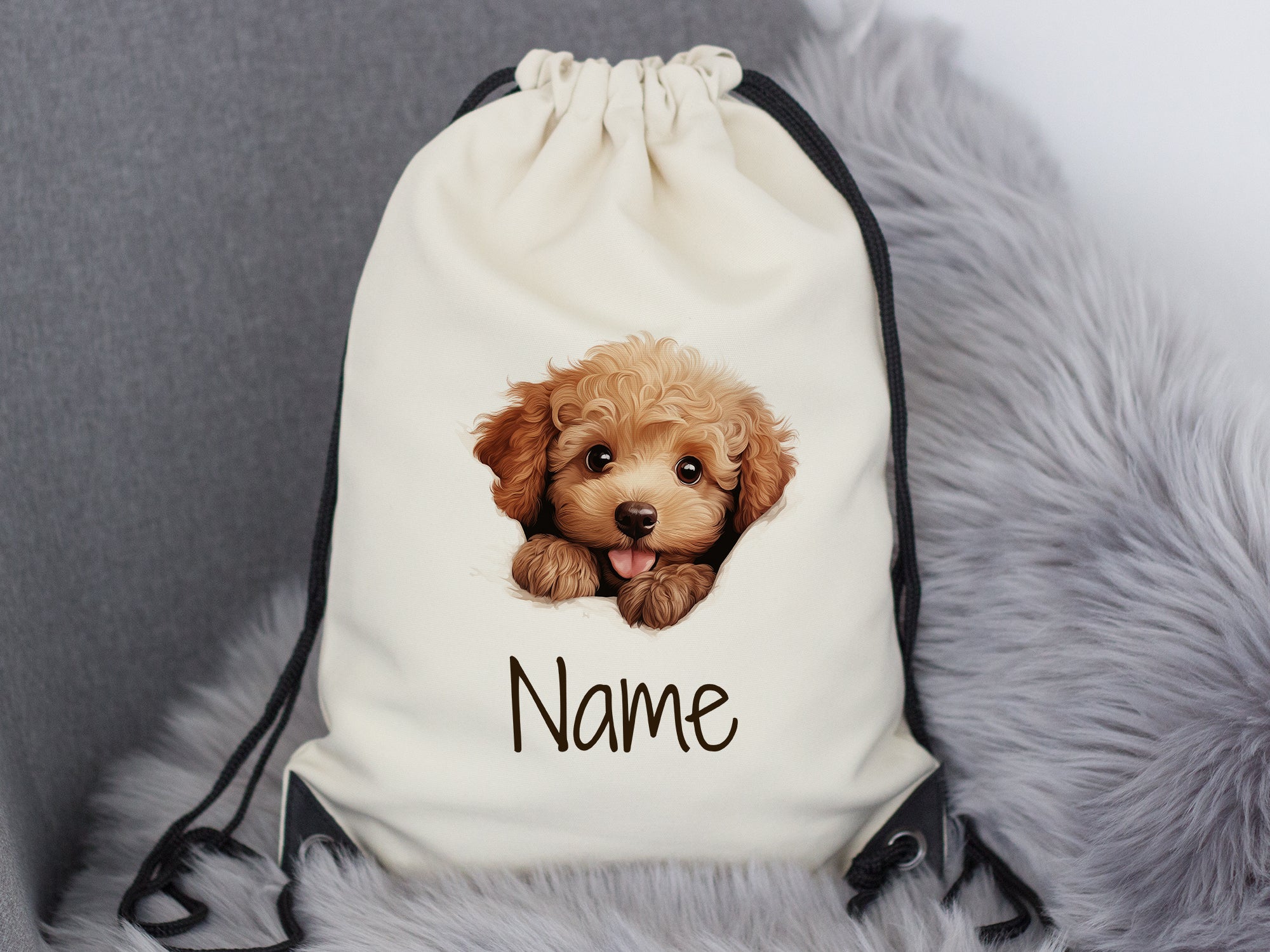 Beige Rucksack mit niedlichem Hundemotiv und Name.