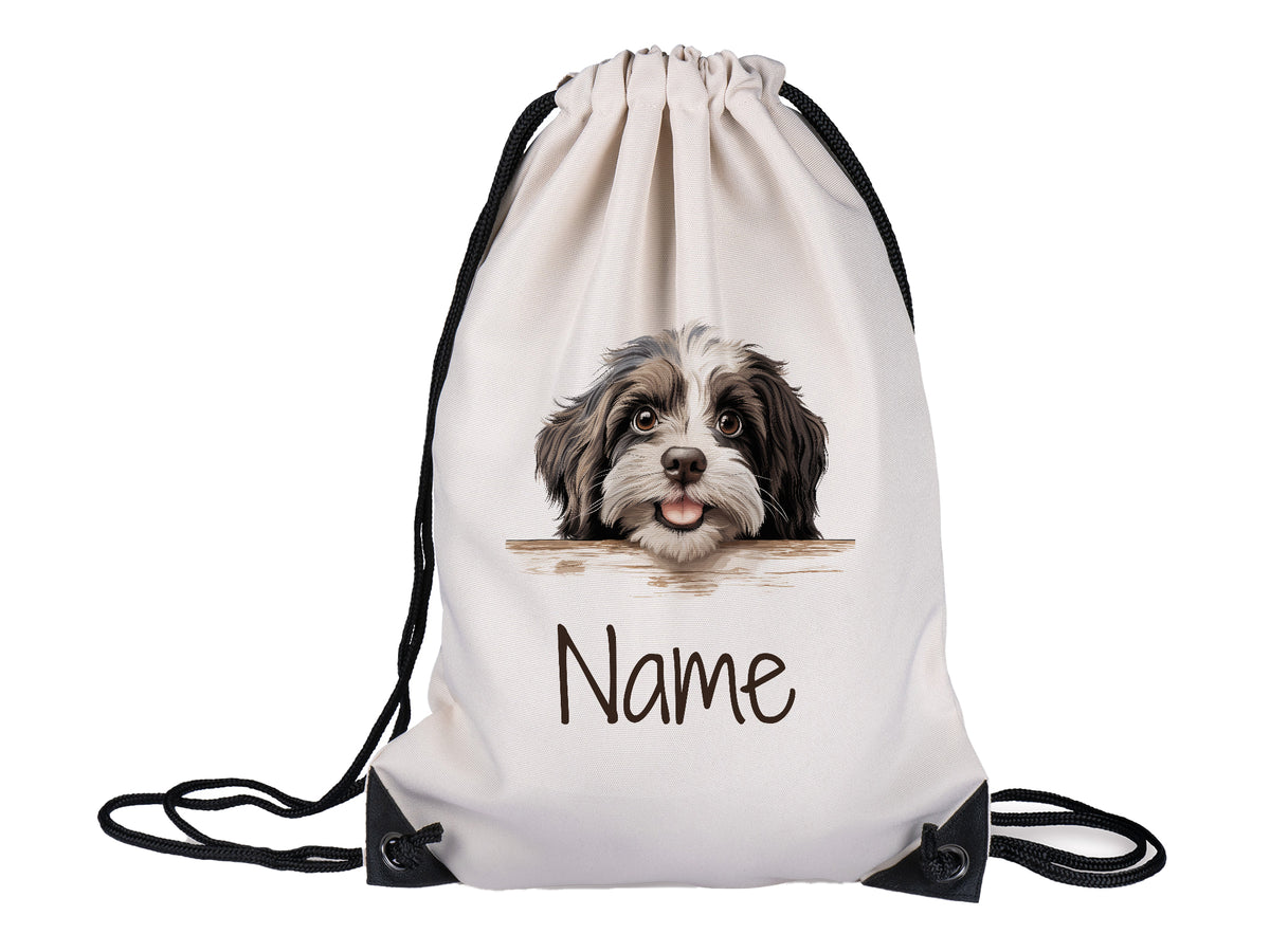 Beige Turnbeutel mit Hundemotiv und personalisierbarem Namen.