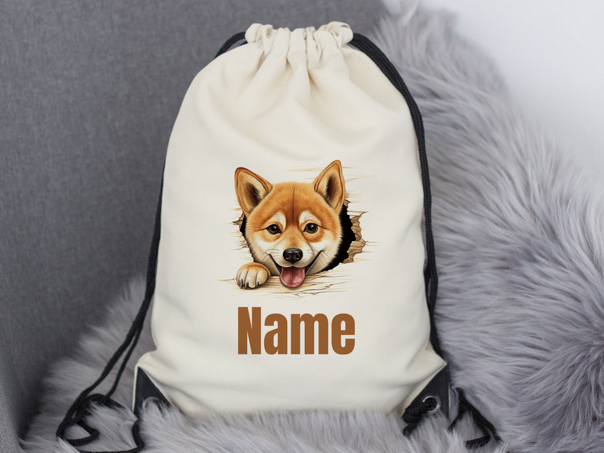 Beige Rucksack mit Corgi-Motiv und Platz für Namen.