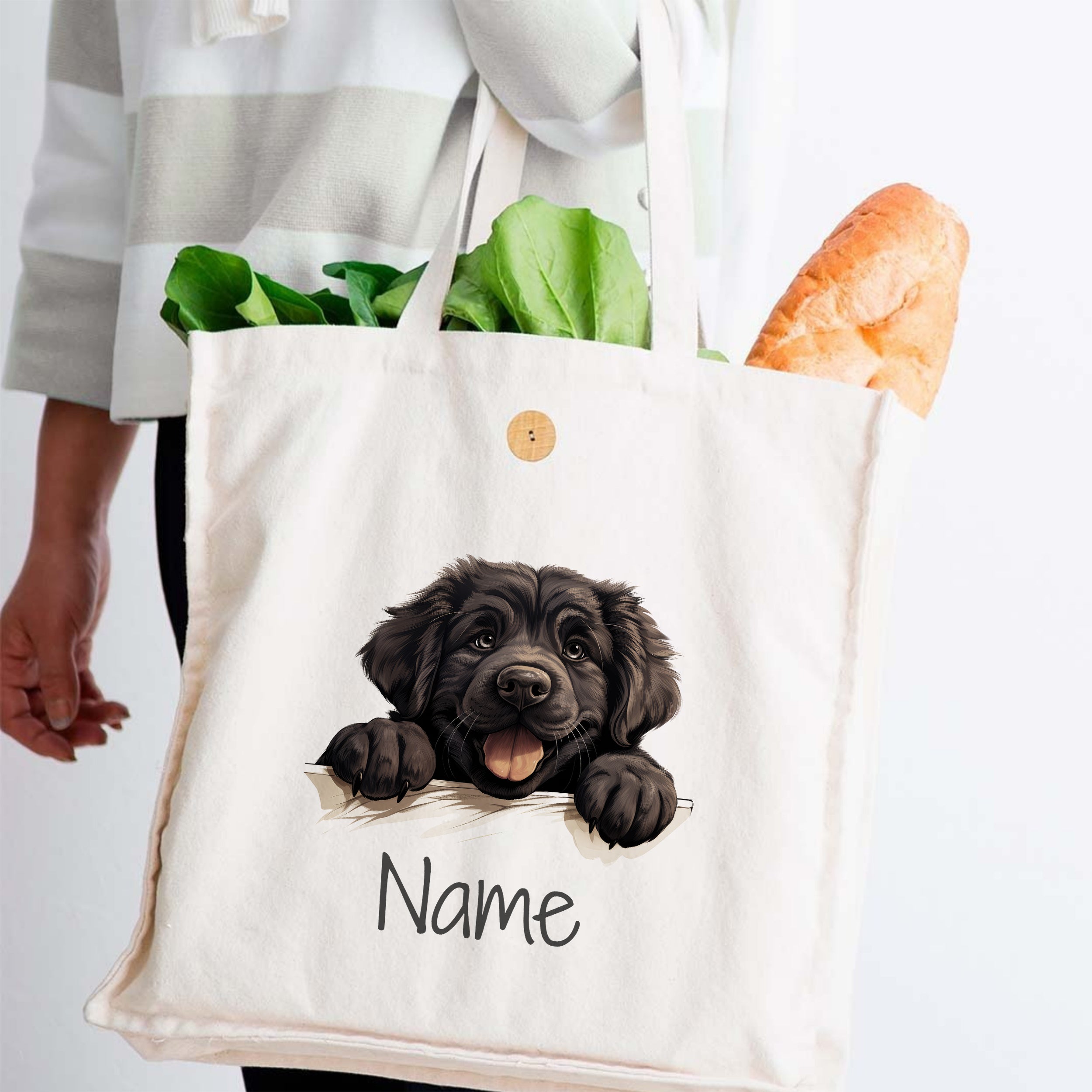 Beige Stofftasche mit Hundemotiv und frischem Brot.