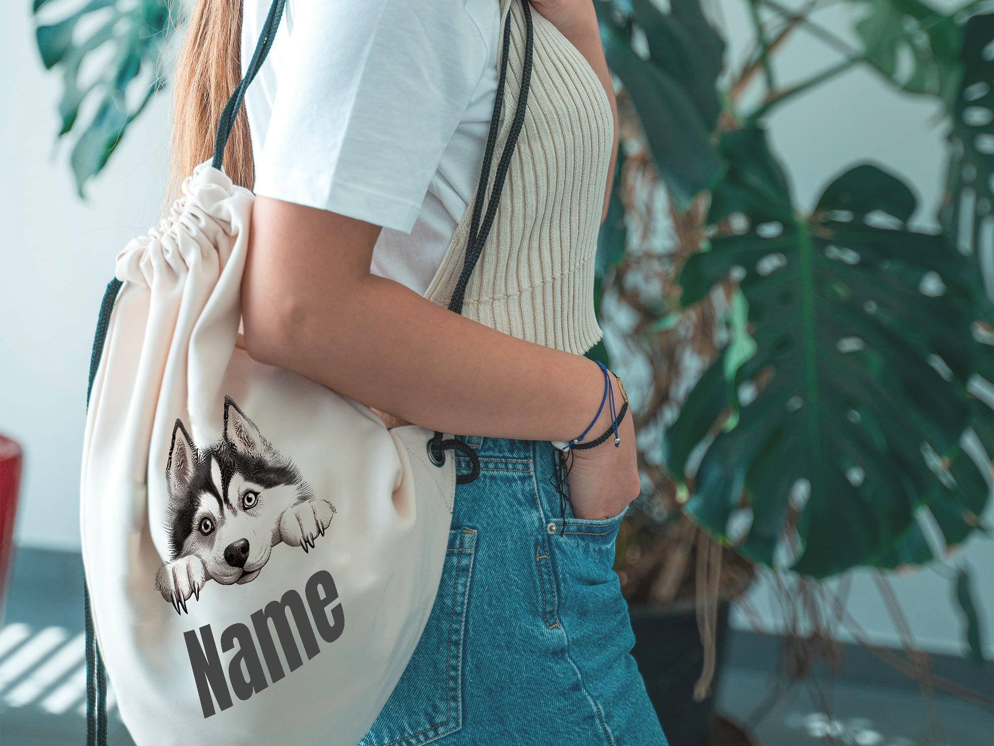 Beige Rucksack mit Husky-Motiv und Platz für Namen.