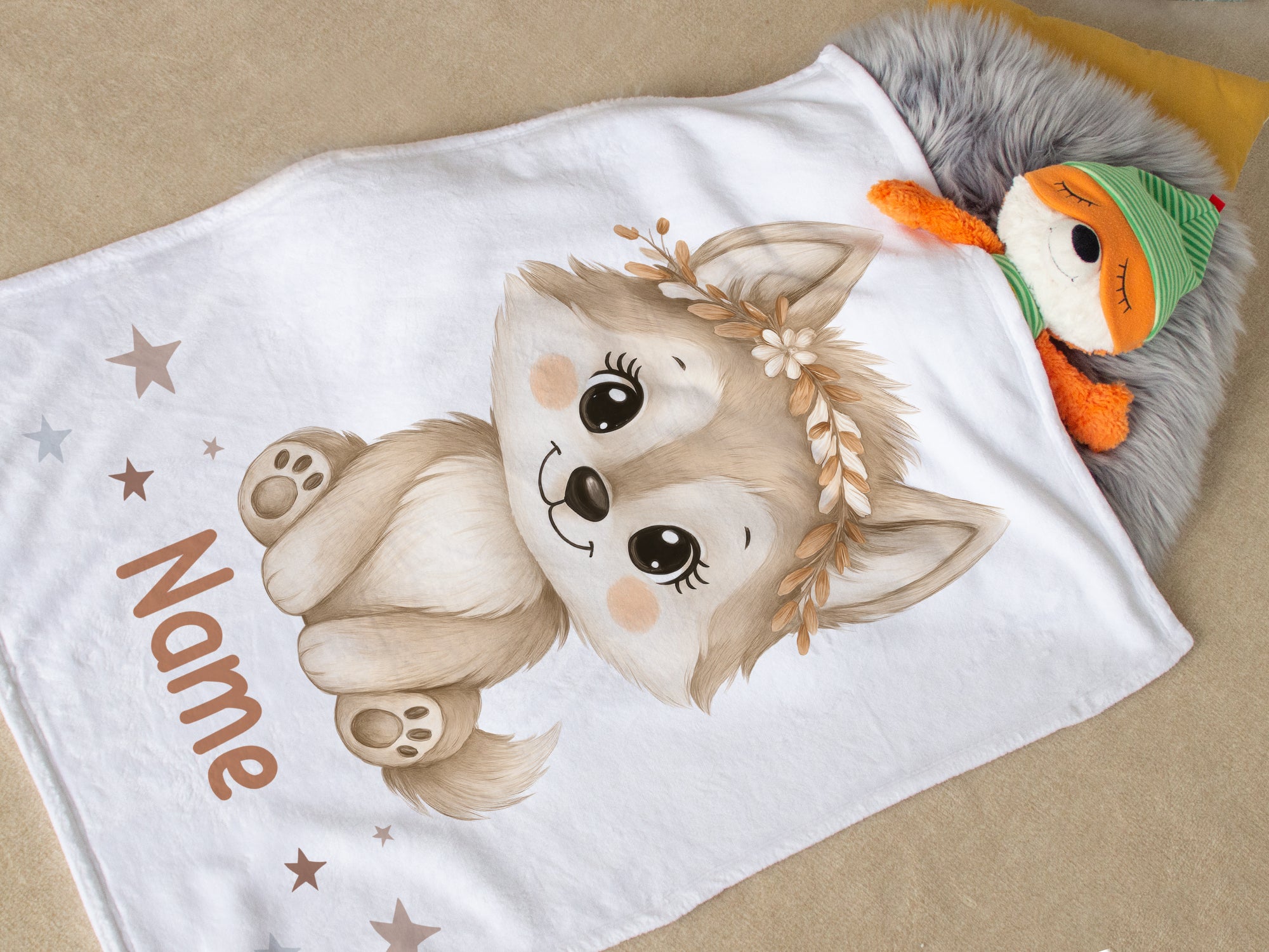Kuscheldecke mit niedlichem Wolfsmotiv und personalisierbarem Namen.