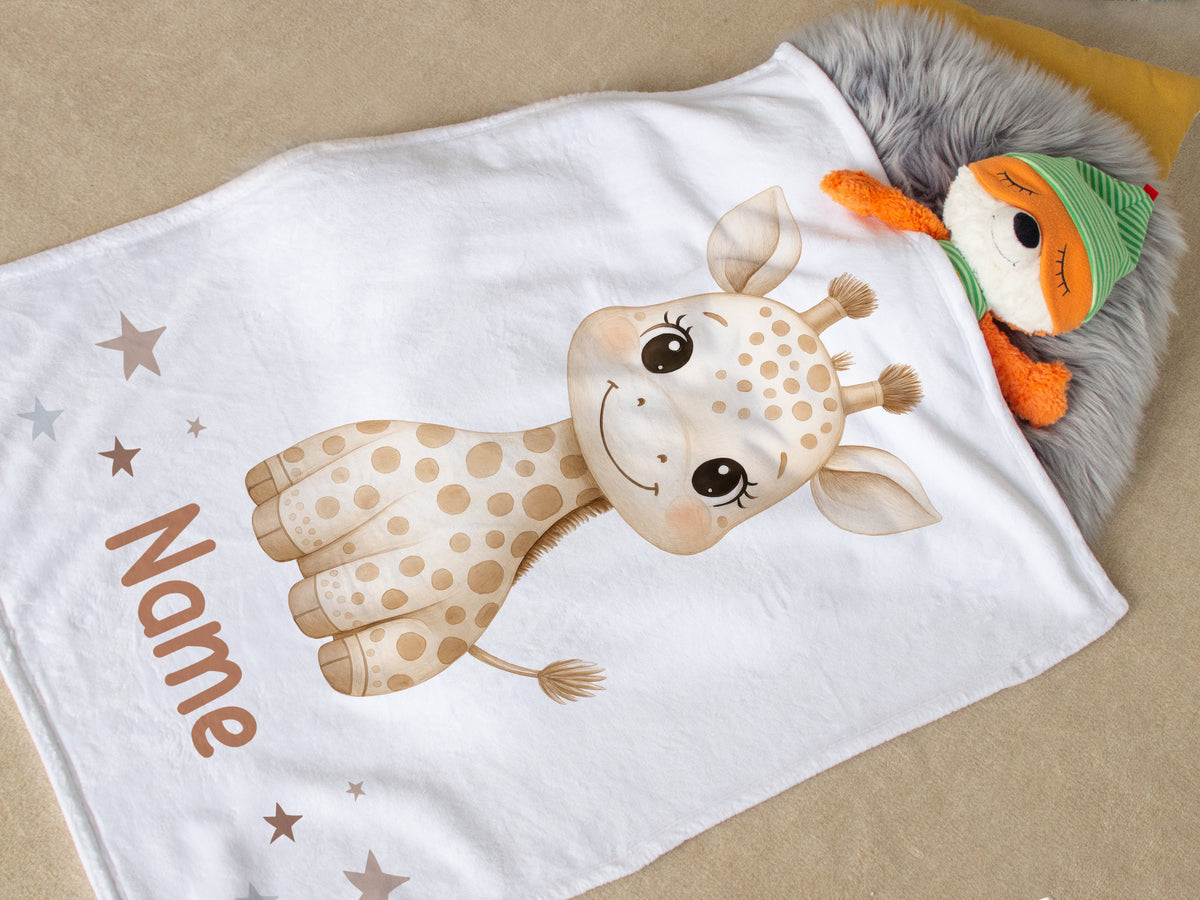 Giraffen-Decke in Weiß mit personalisiertem Namen.