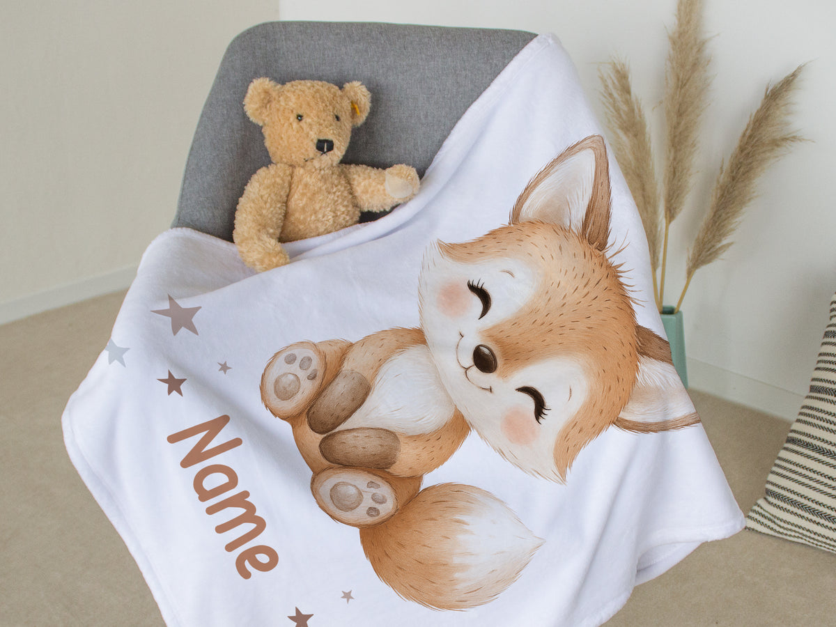 Fuchs-Decke mit personalisiertem Namen in sanften Farben.