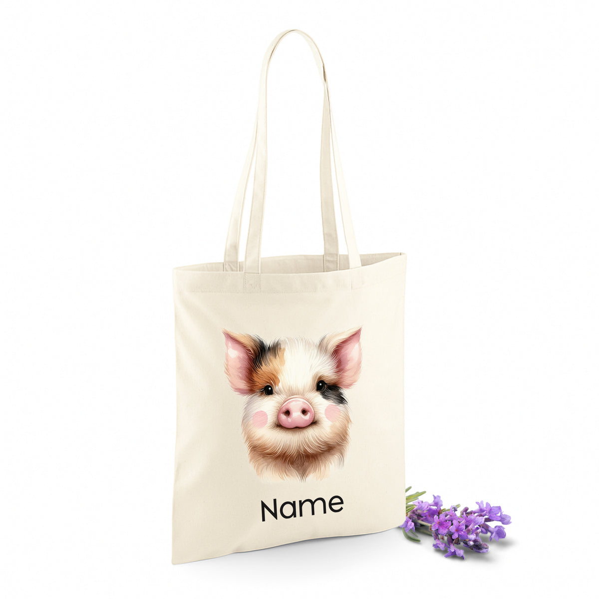 Beige Stofftasche mit Schwein-Motiv und personalisierbarem Namen.