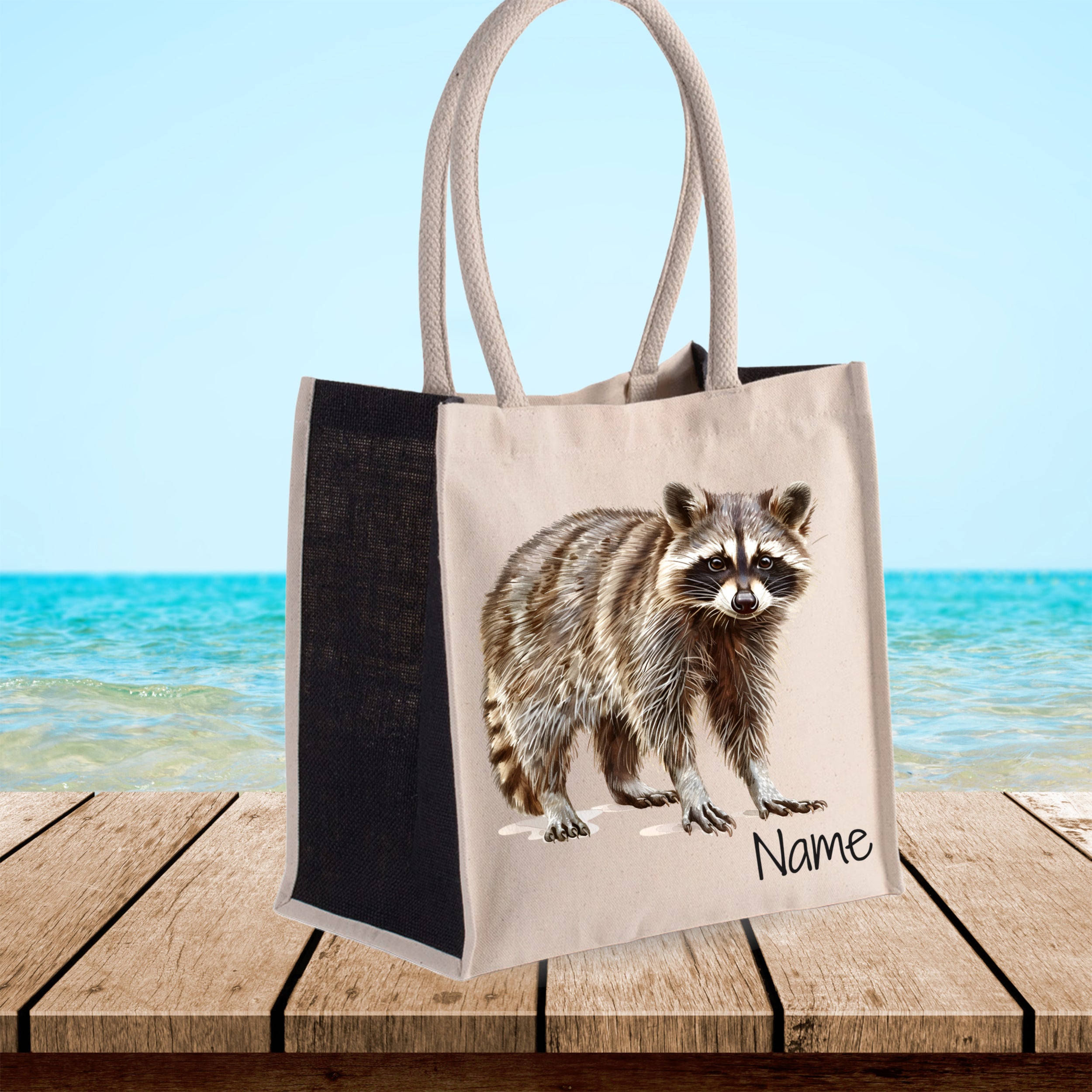 Stofftasche mit Waschbär-Motiv und personalisierbarem Namen.