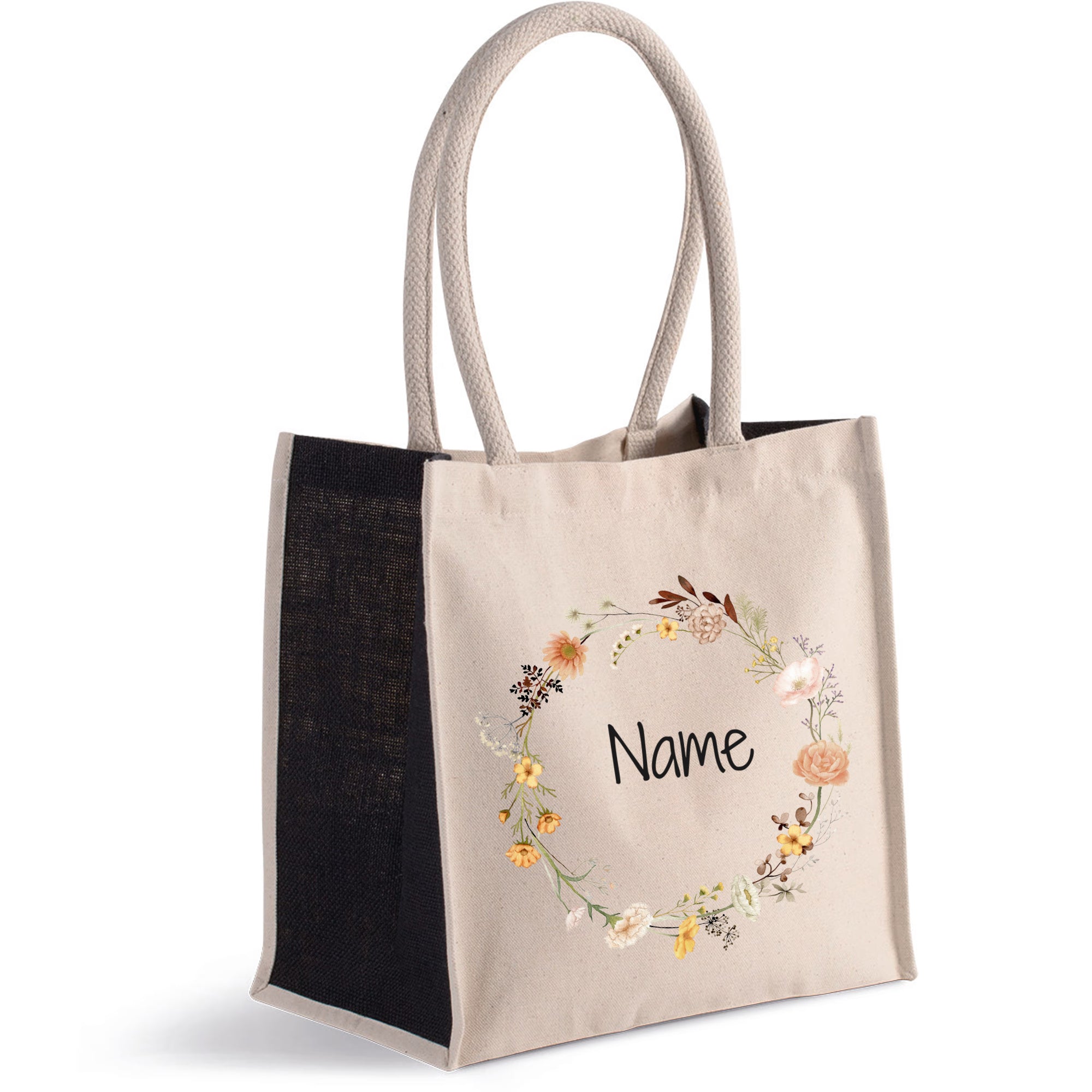 Beige Stofftasche mit floralem Muster und personalisiertem Namen.