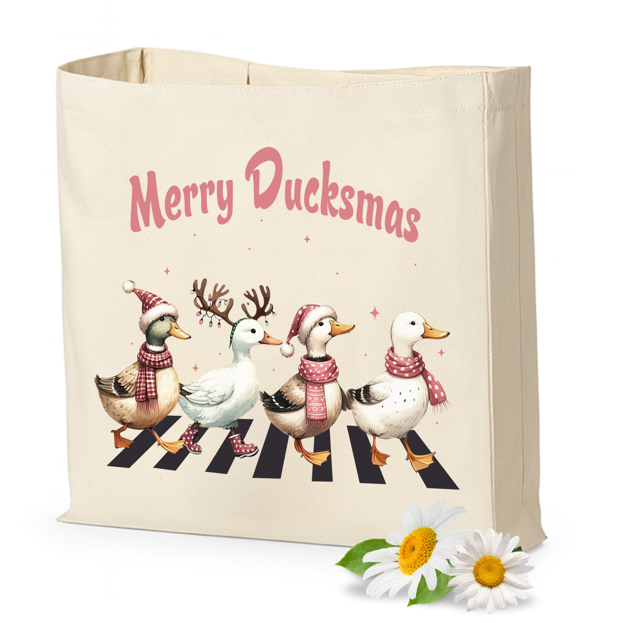 Stofftasche mit Enten-Motiv und Weihnachtsaufschrift.