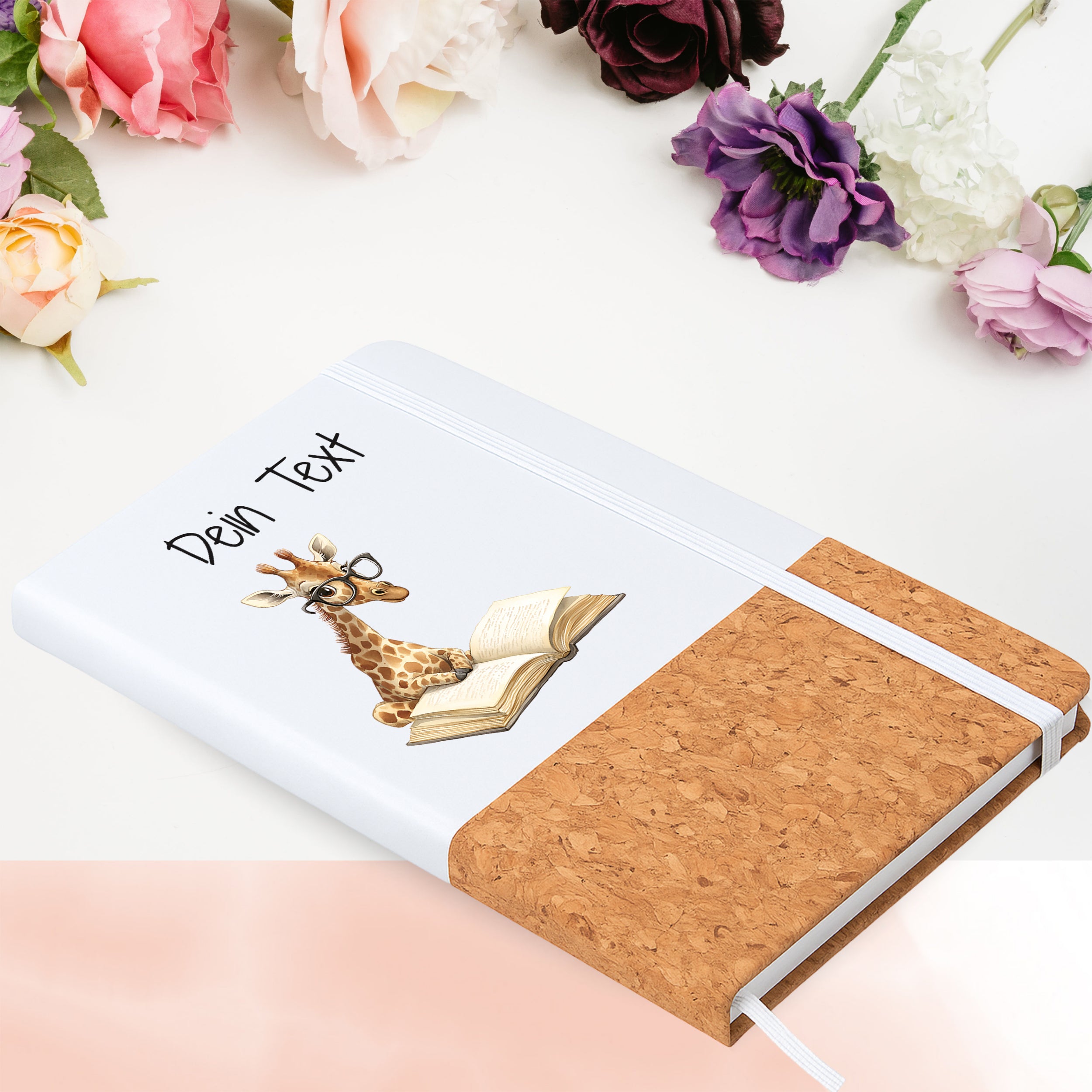 Notizbuch mit Giraffenmotiv in Blumenarrangement