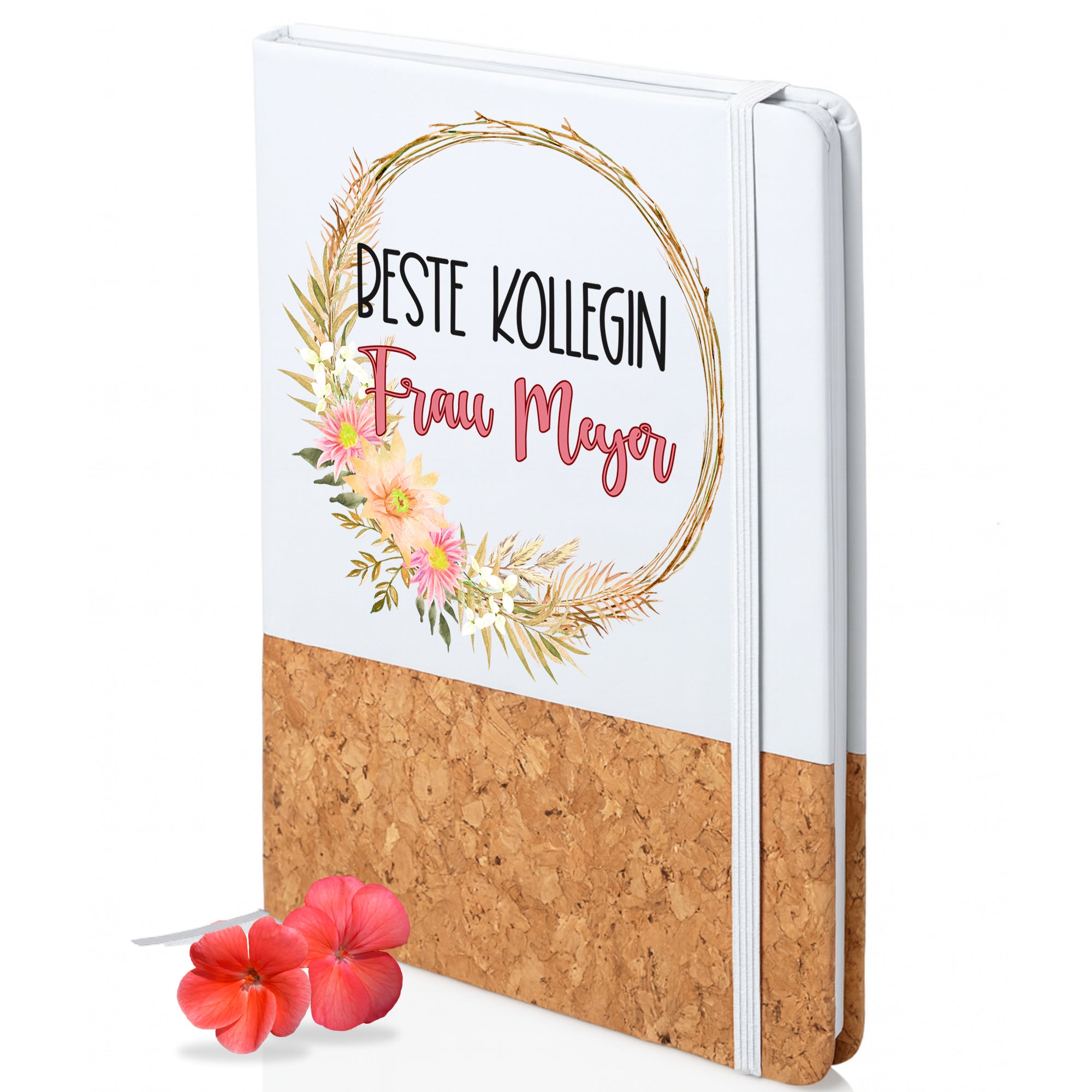 Notizbuch mit Korkboden, floraler Dekoration und Aufschrift.