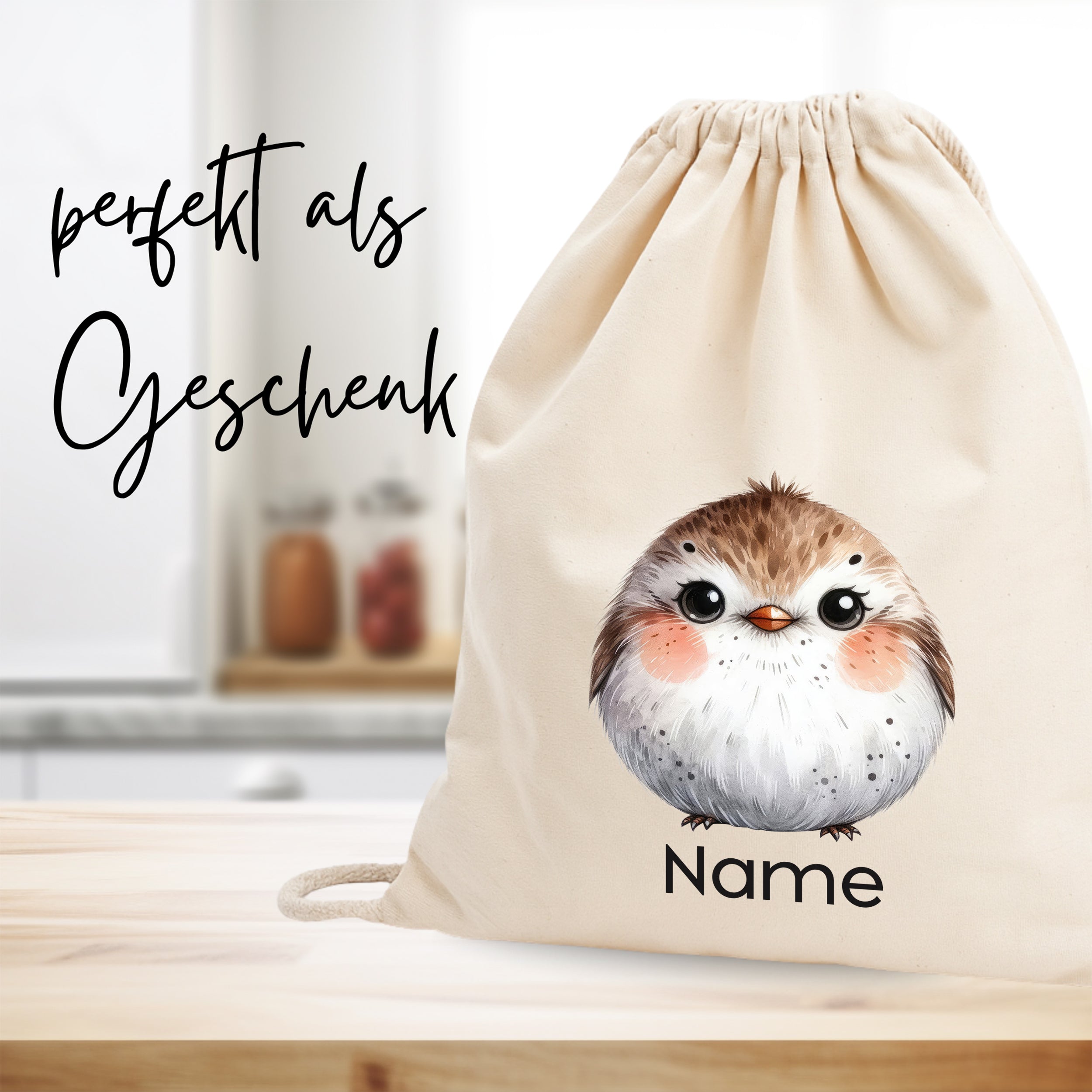 Beige Baumwollbeutel mit niedlichem Vogelmotiv und personalisierbarem Namen.