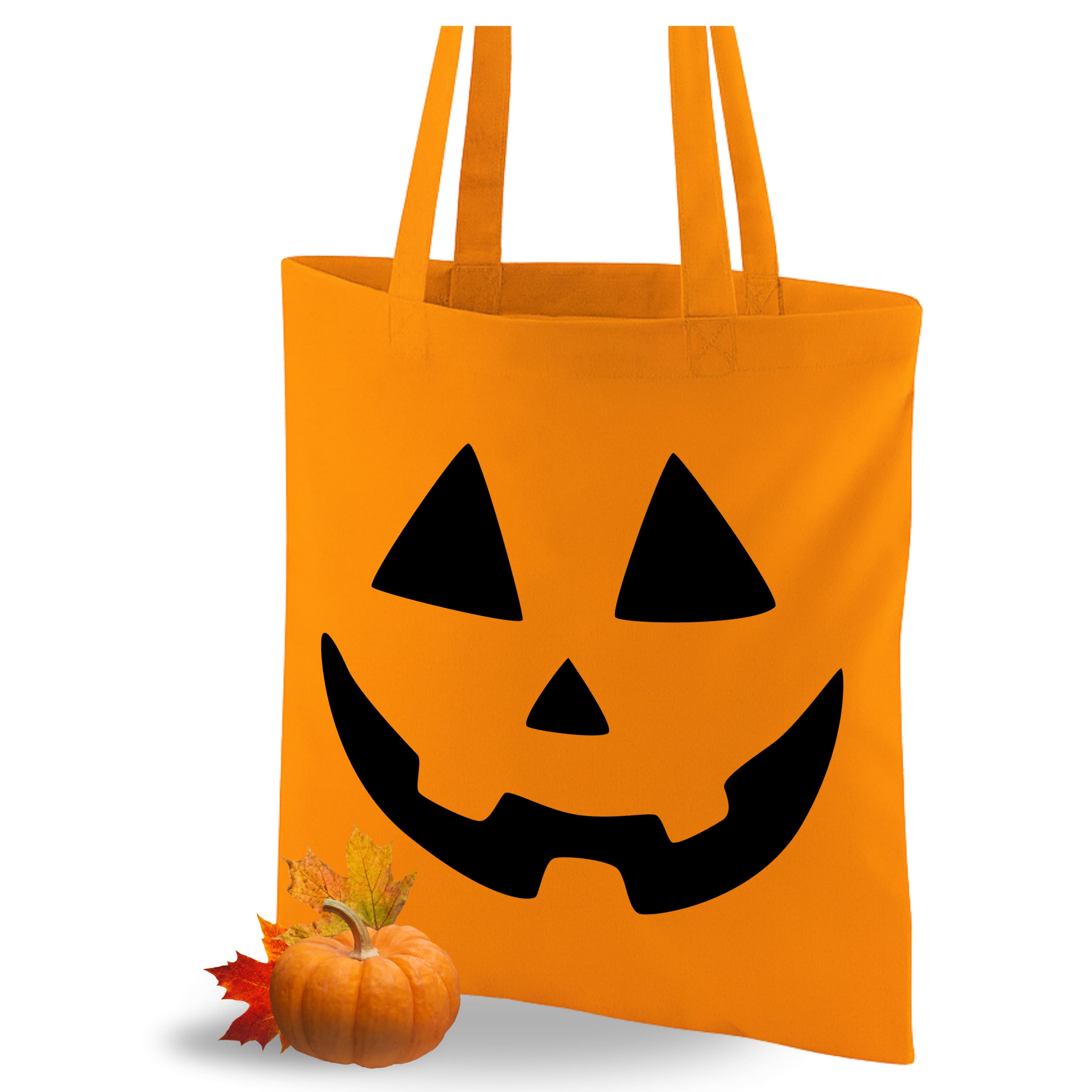 Orange Tasche mit schwarzem Kürbisgesicht und Dekoration.